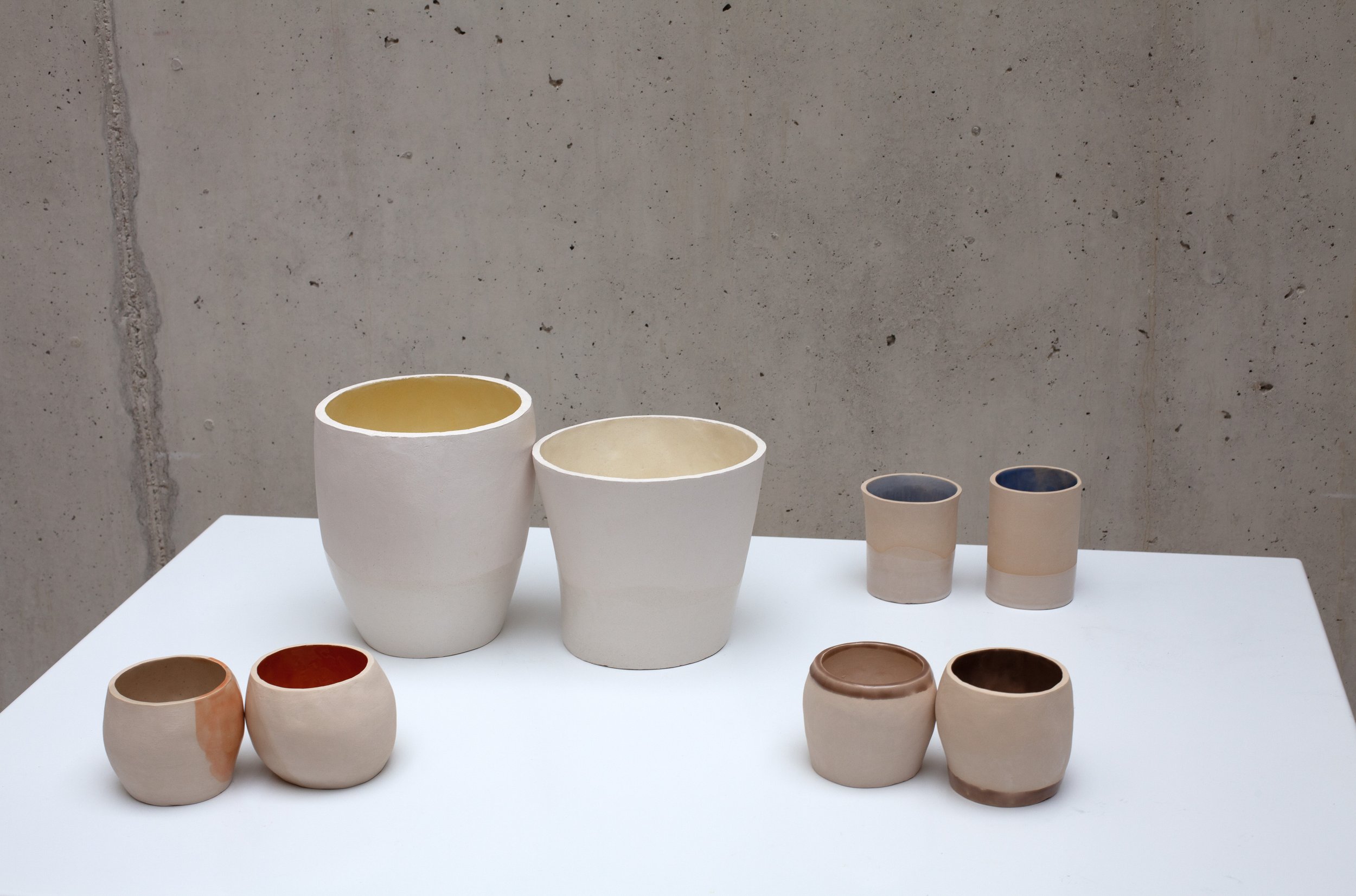 Plant pots know a strong archetype. To free the subject from its known appearance I have made these couples of ceramic pots. Each set is as logic together as one round pot by itself.