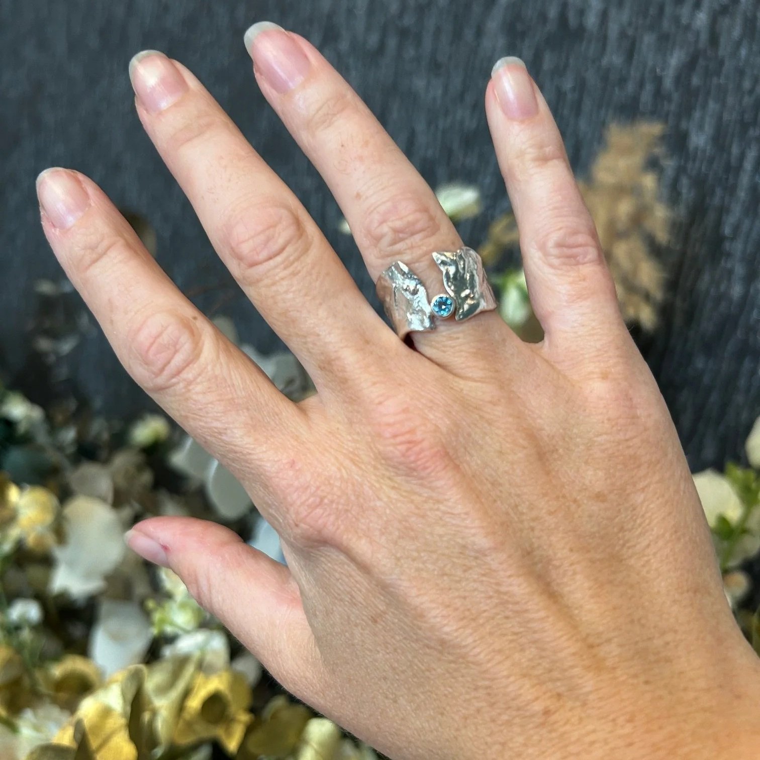 open-reticulted-silver-topaz-ring.jpg