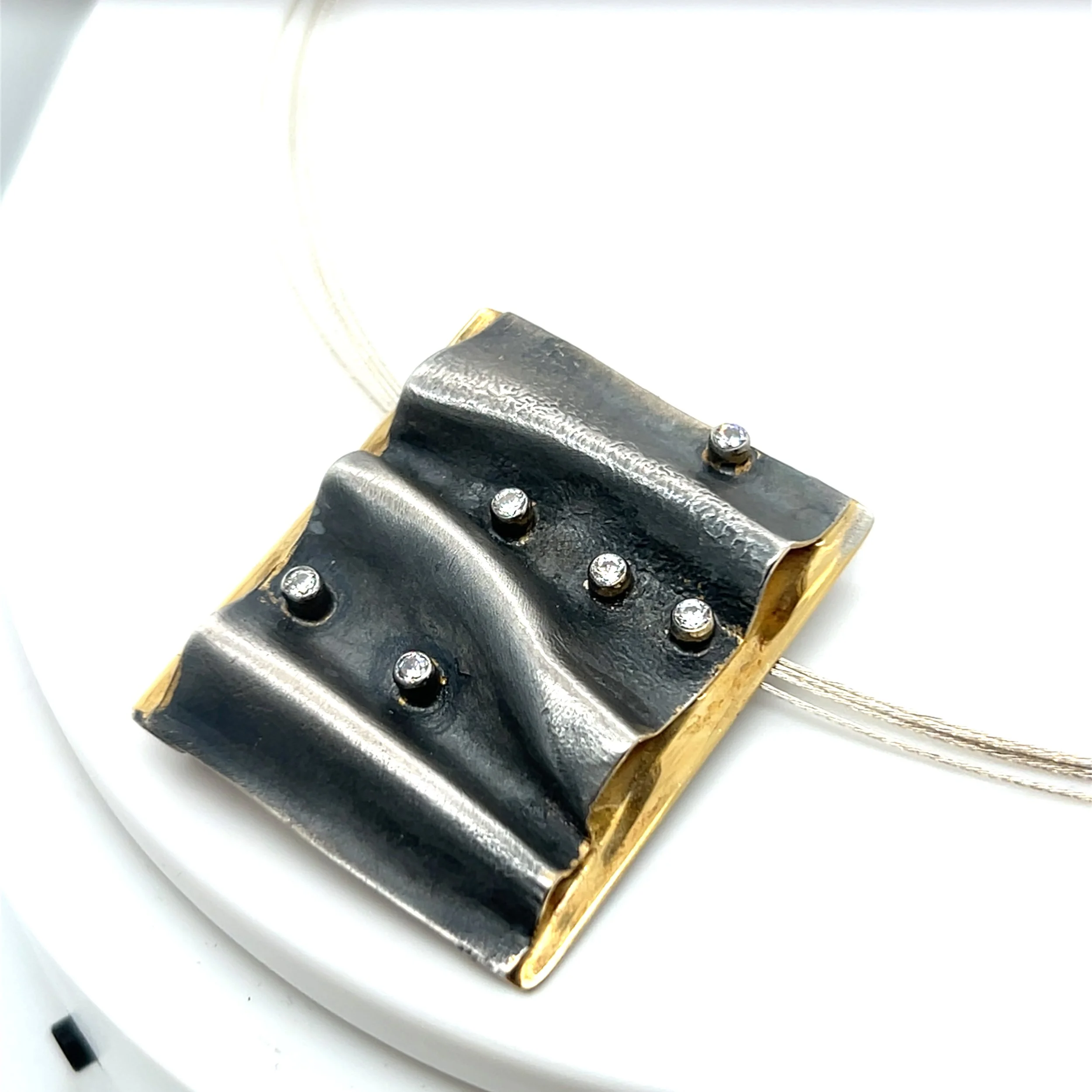 oxi-ripple-pendant-brooch.jpg