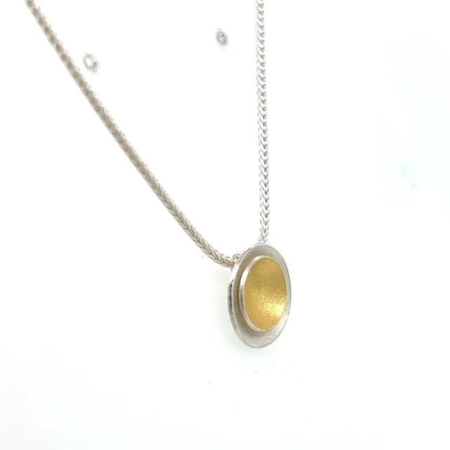 manu-cup-pendant.jpg