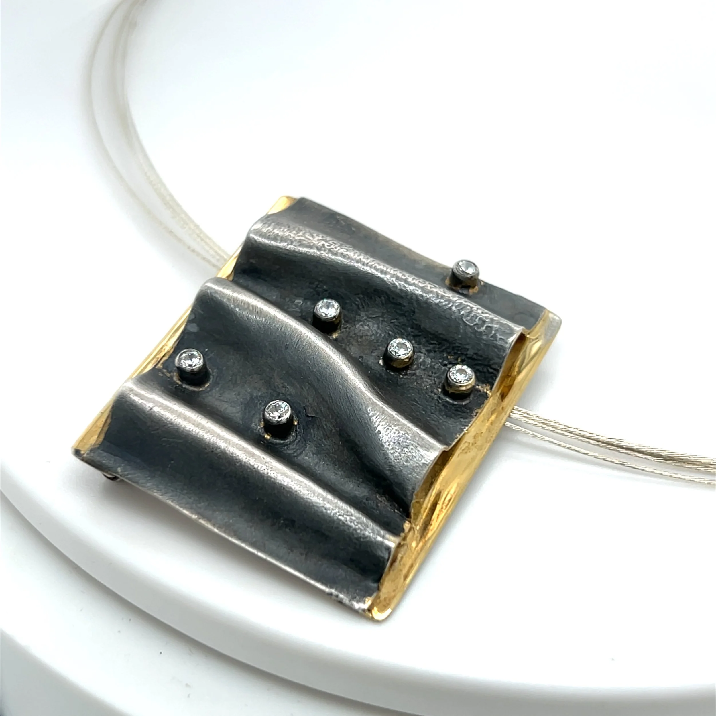 preloved-oxi-ripple-pendant.jpg