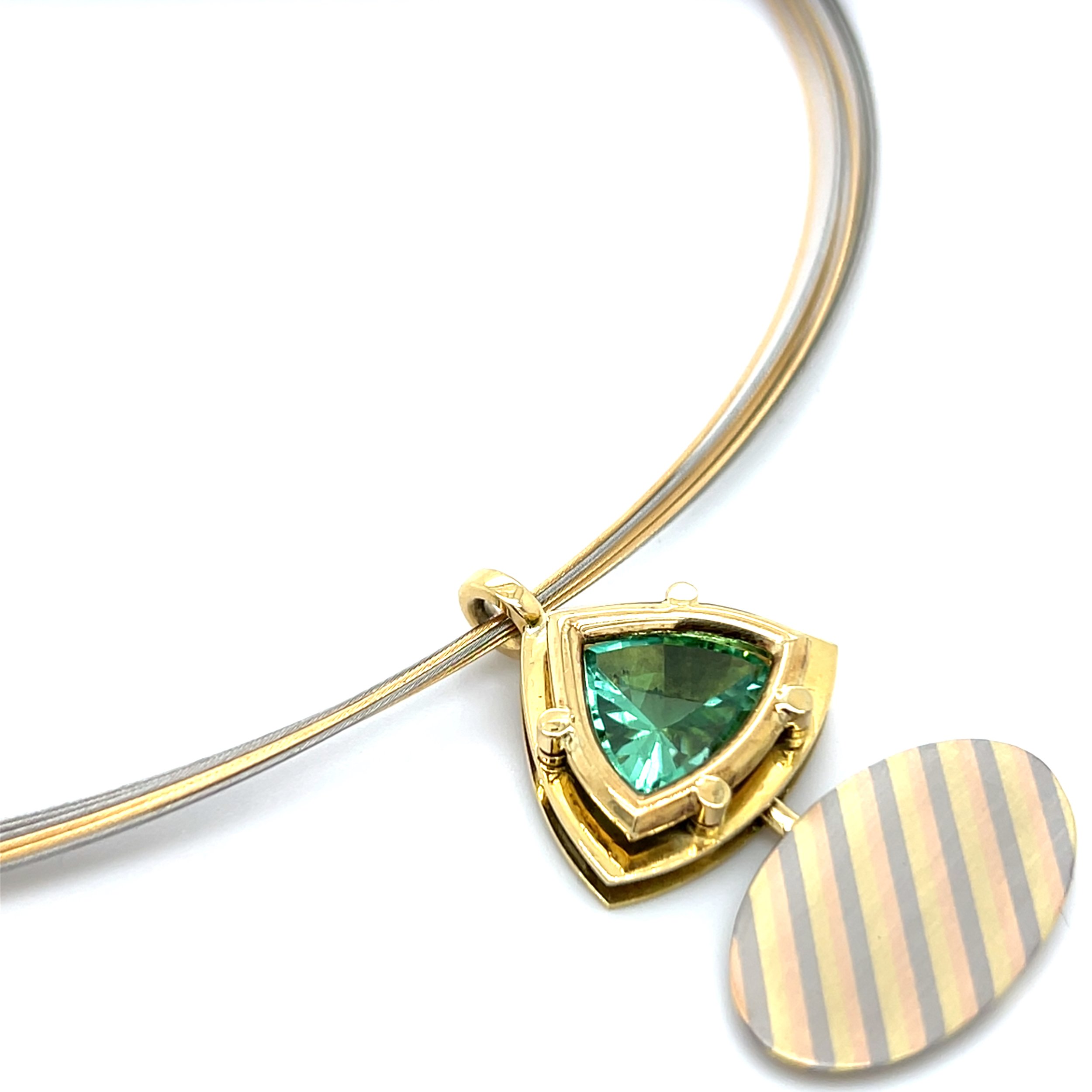 gold-roger-morris-trillion-pendant.jpg