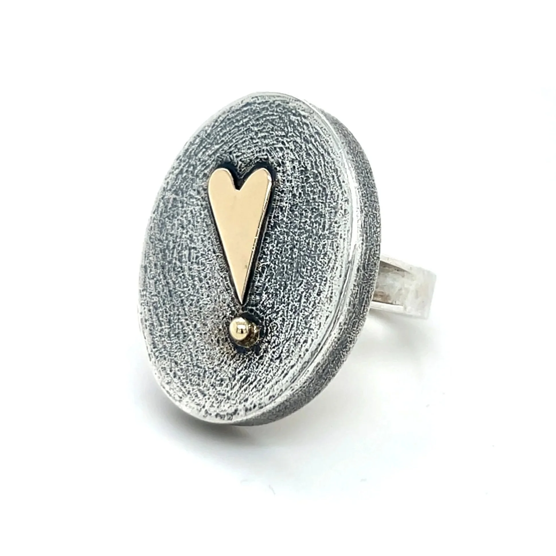 silver-statement-heart-ring.jpg