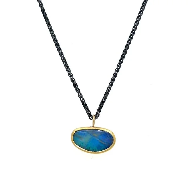 naomi-tracz-oval-opal-pendant-silver-oxidised-gold.jpg