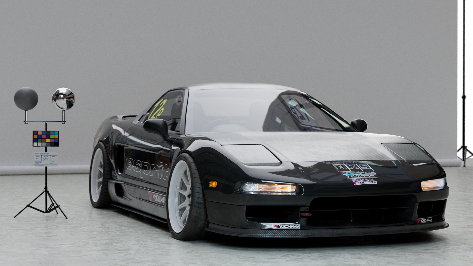 Honda NSX stationed in a studio setup. Wide lens