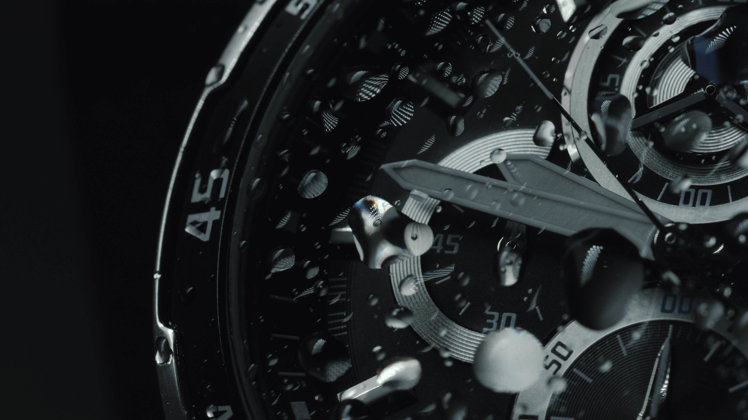 Close-up of a mechanical watch's intricate internal gears and mechanisms with water droplets on the surface.