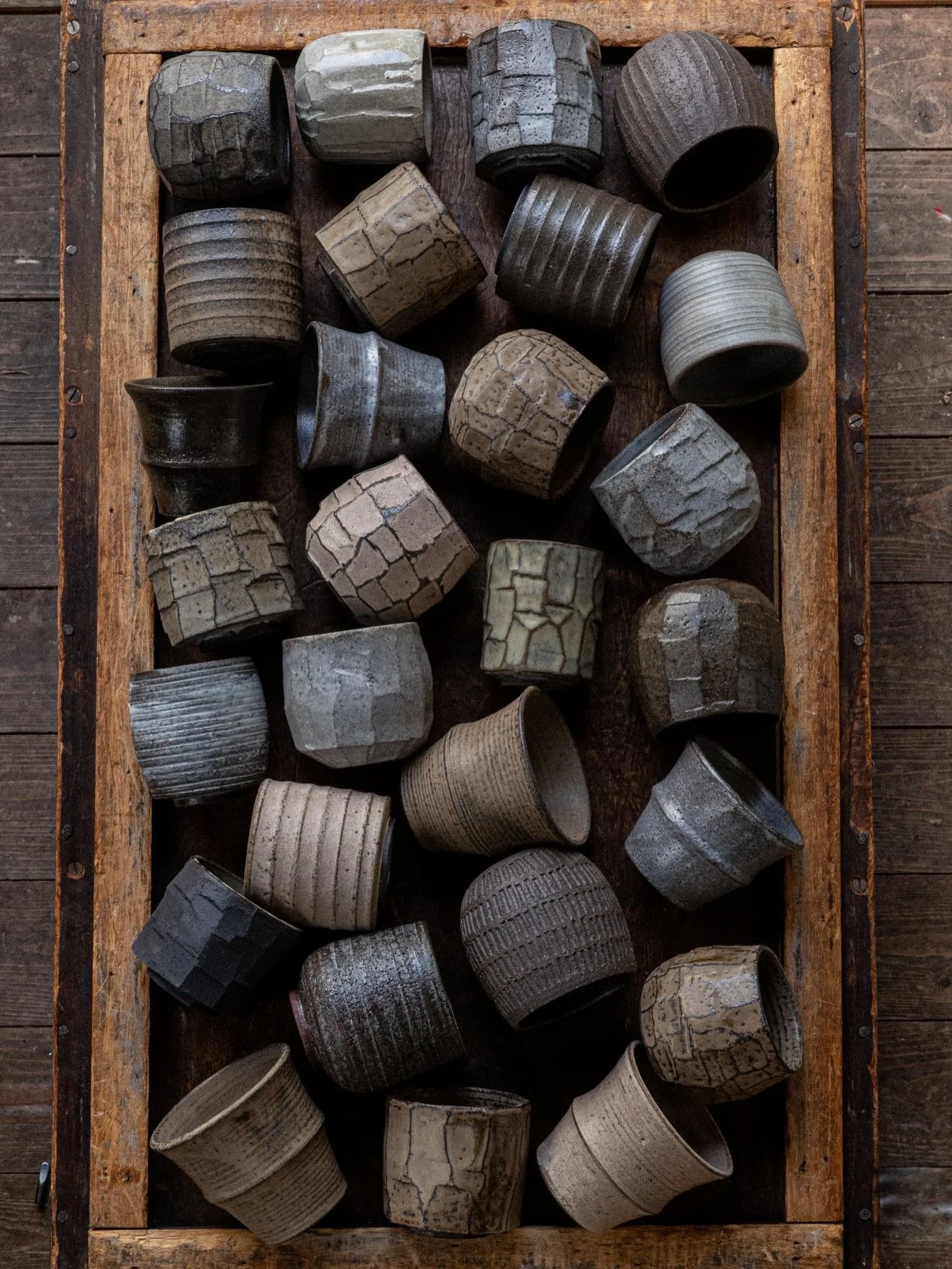 A little army of stoneware cups ready for @potfest.co.uk next week &mdash; and for the first time it&rsquo;s happening in Glasgow! Who&rsquo;s coming?

Potfest in the City - Glasgow. November 28th-30th, Wasps Studios - Briggait.

#modernceramics #pot