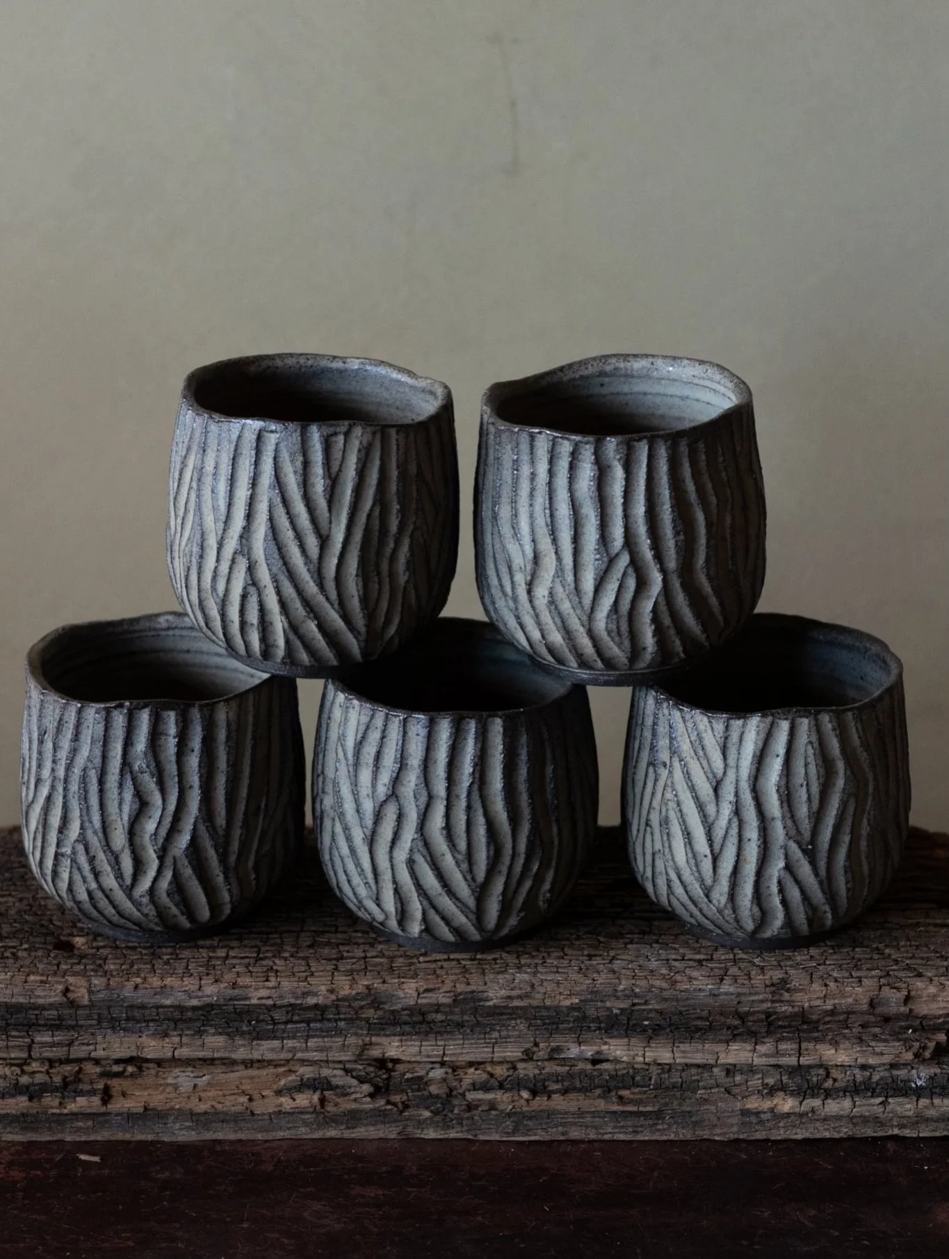 Carved cups in black stoneware clay and wood ash glaze. These are my favourites lately &mdash; the carving process isn&rsquo;t the easiest, which makes it even more satisfying when they turn out just as I imagine.

#pottery #ceramics #cups #coffeecup
