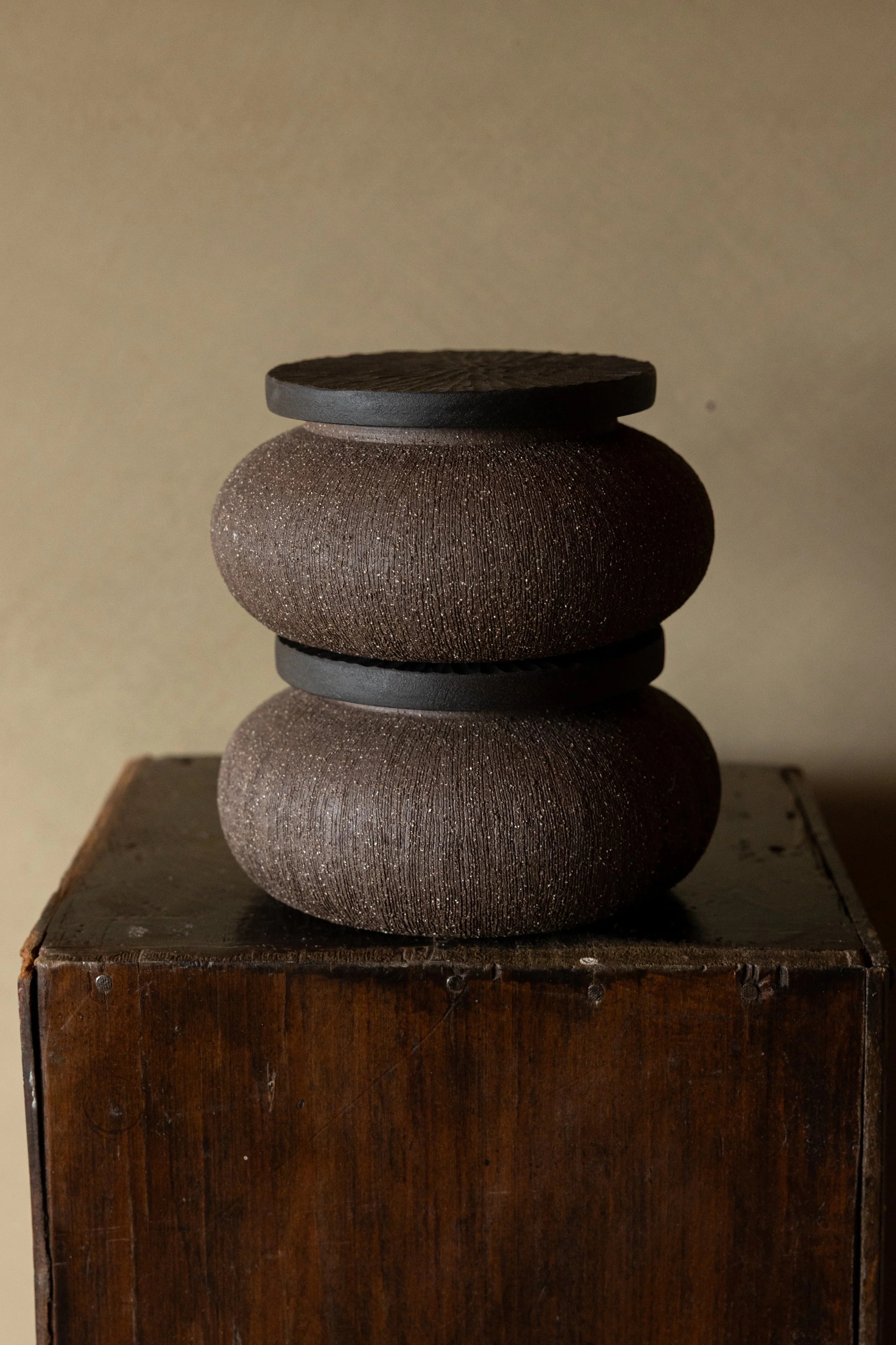 Jar with hand-carved wooden lid