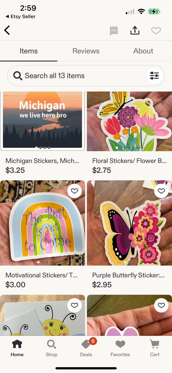 Etsy seller's app displaying various sticker products, including Michigan stickers, floral stickers, rainbow with text, butterfly with flowers, and a cute insect sticker.