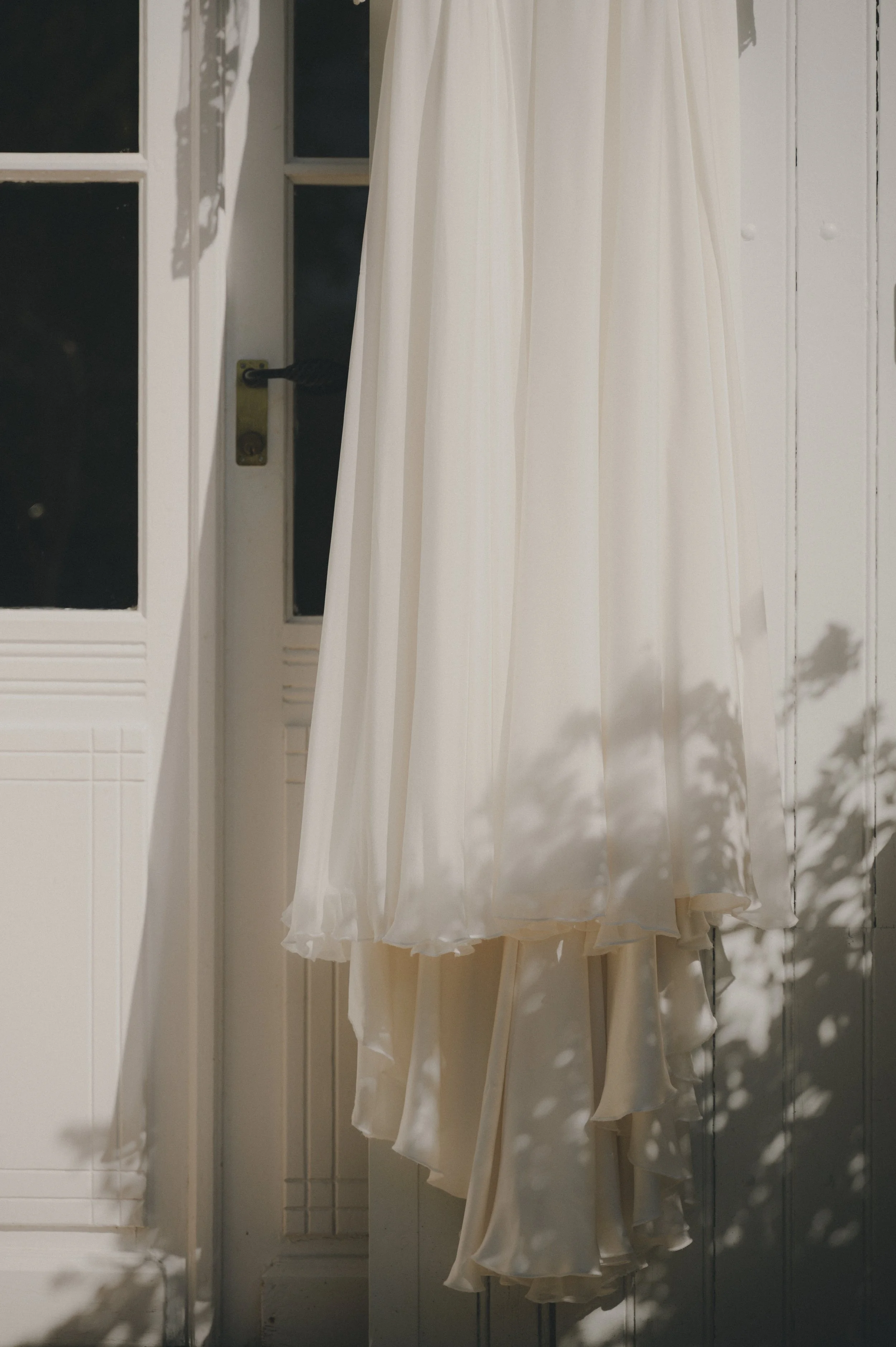 Photographie détail d'une robe de mariée 