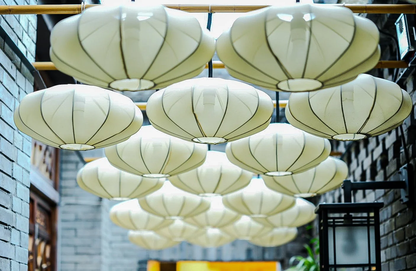 Lantern Passage
Chengdu, China
Between two busy streets filled with shops and visitors, this alleyway was unexpectedly quiet. The repeating lanterns caught my attention, and I spent some time looking for a different way to photograph them. I liked th