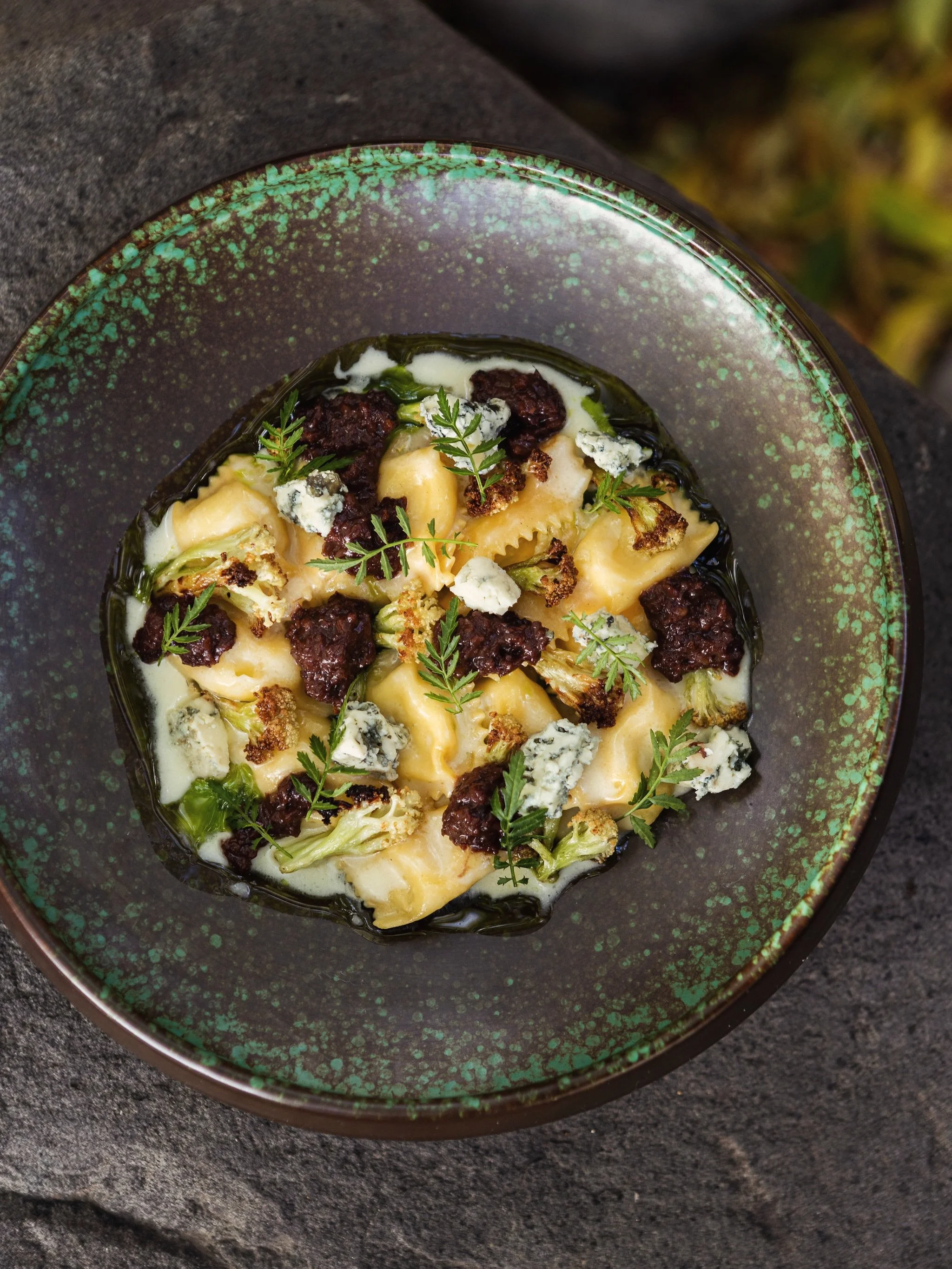 We choose ingredients that inspire us and they shape the dishes you love. Poplar Bluff Organics Potato Agnolotti, Sudo Farms Caulilini, Raisin and Walnut Agrodolce, Bleu D&rsquo;Elizabeth, Marigold.

#rivercafeyyc #RCkitchenstories #yycfood #yycresta