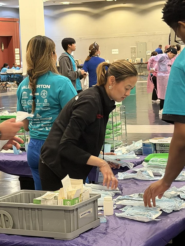 Dr Wendy Steger helping out in the supply area.jpg