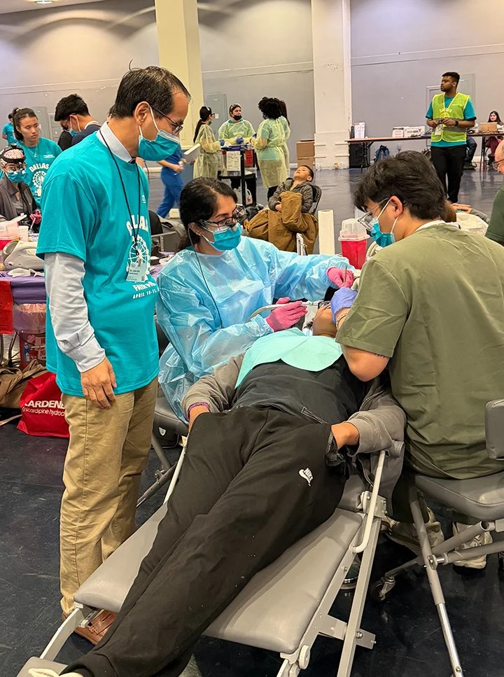 Dr Liang Hong overseeing TAMU College of Dentistry students.jpg