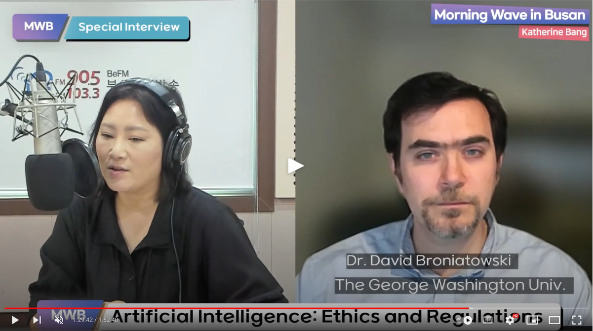 Scene of interview with Broniatowski and Host