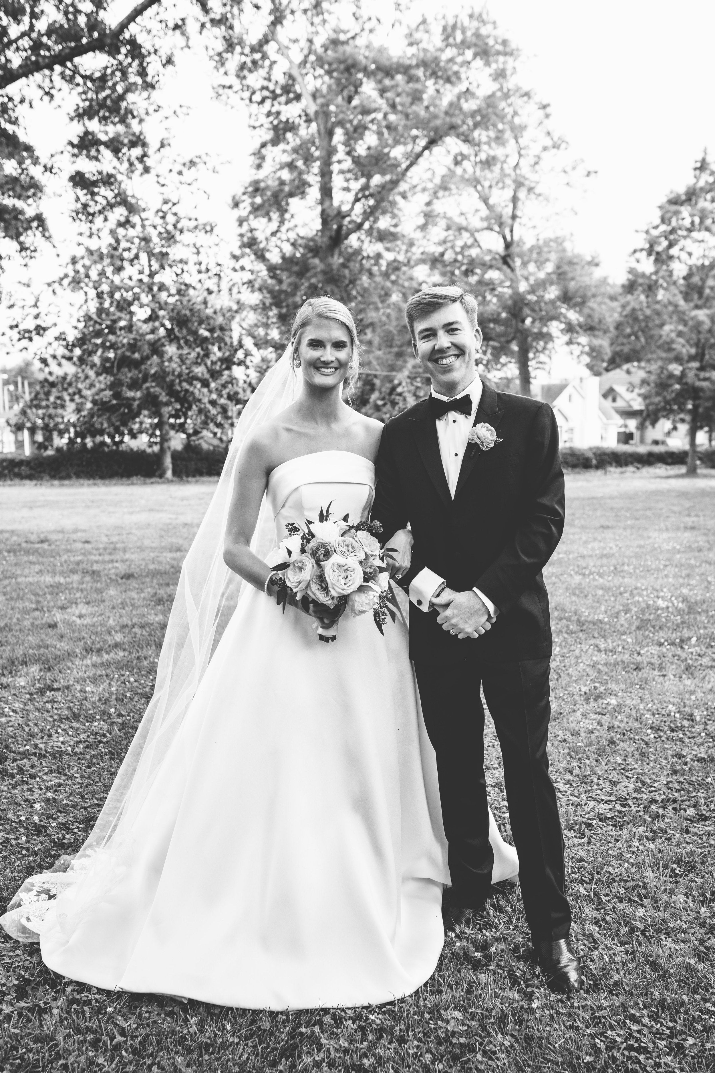 SC-Wedding-Couple-Posing-in-Front-of-Historic-Estate.jpg