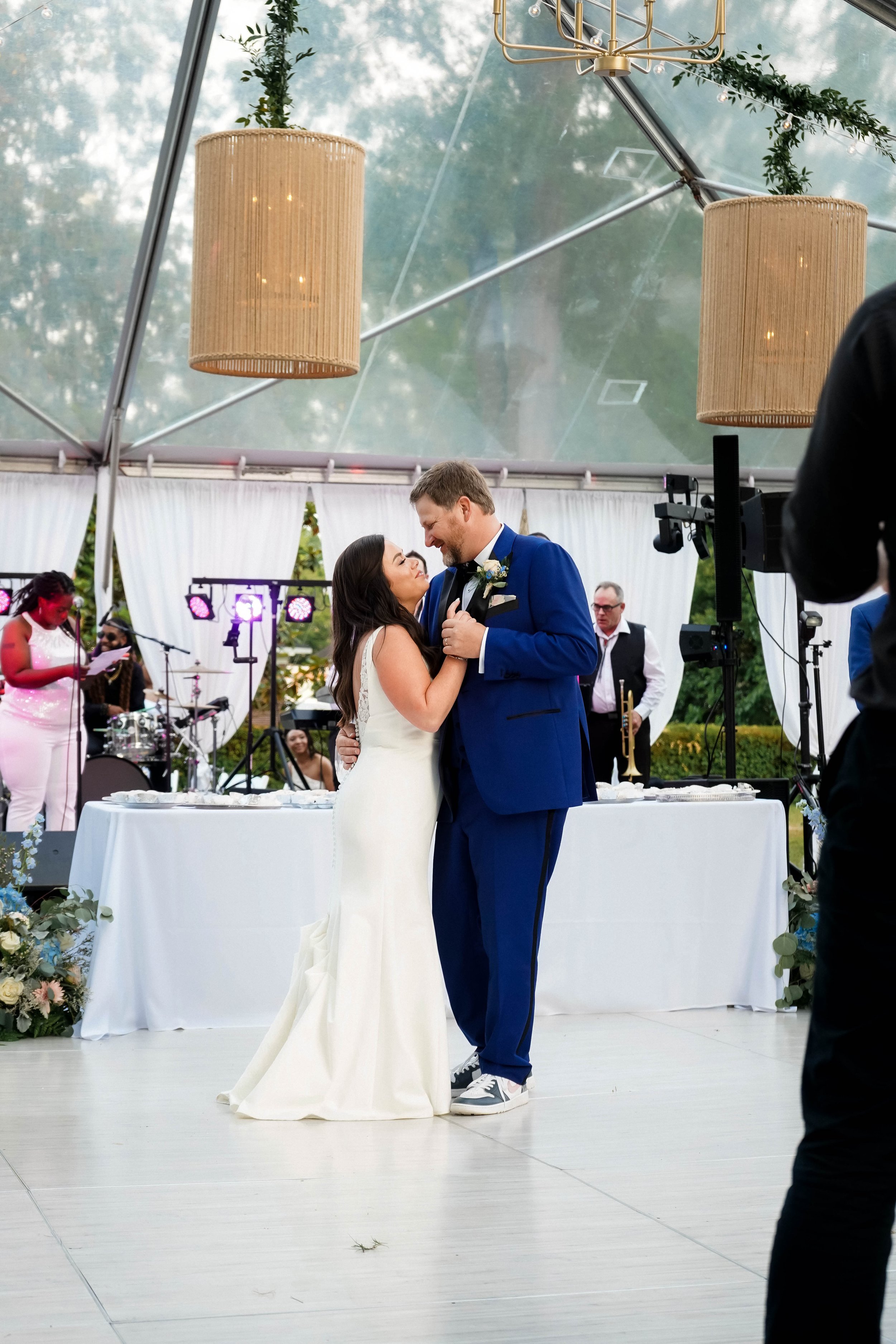 white-dance-floor-twinkle-lights-couples-first-dance-clear-top-tent-south-carolina.jpg