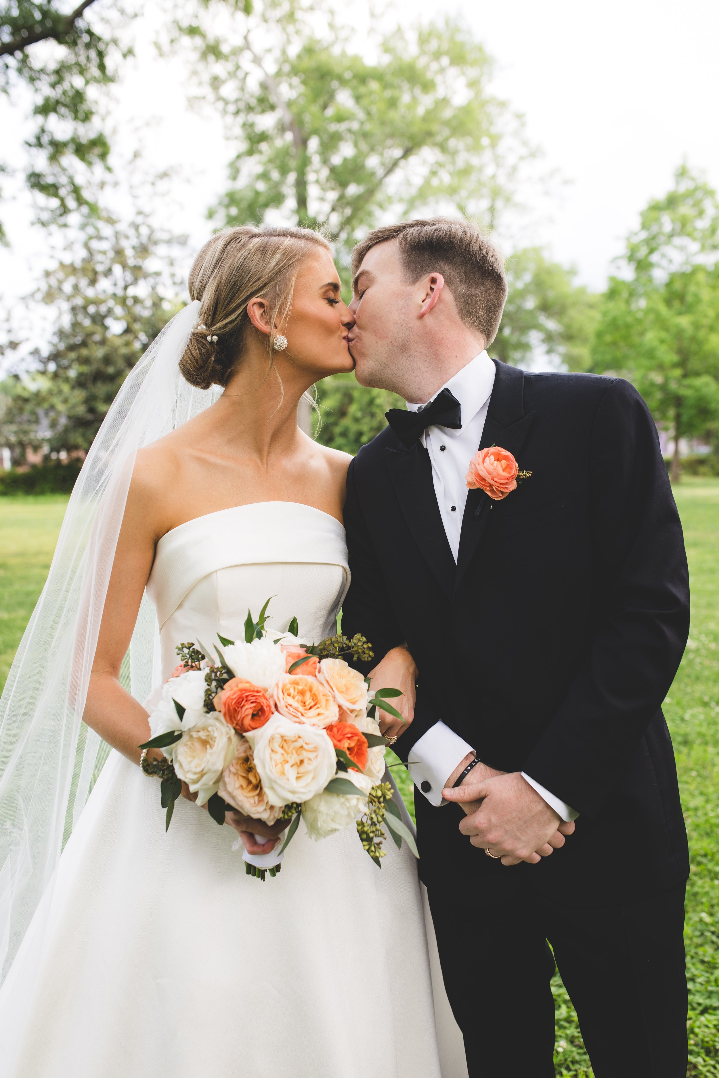 Wedding-Couple-Sharing-a-Tender-Kiss.jpg