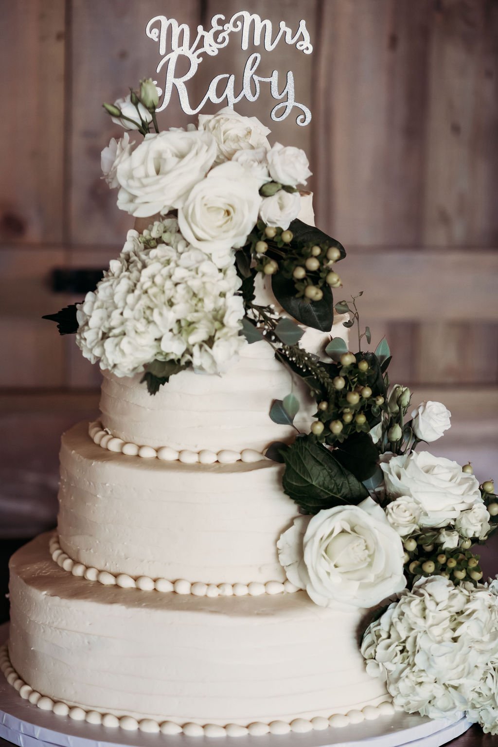 ocoee crest classic wedding cake with florals.jpg