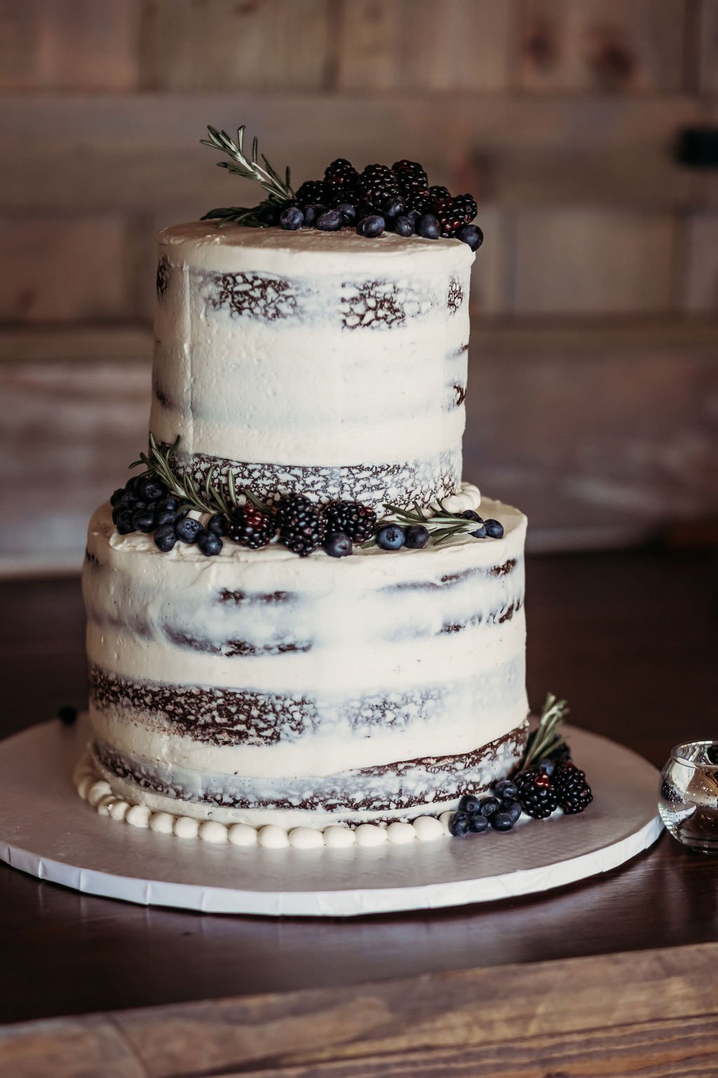 ocoee crest naked wedding cake with blueberries and blackberries.jpg
