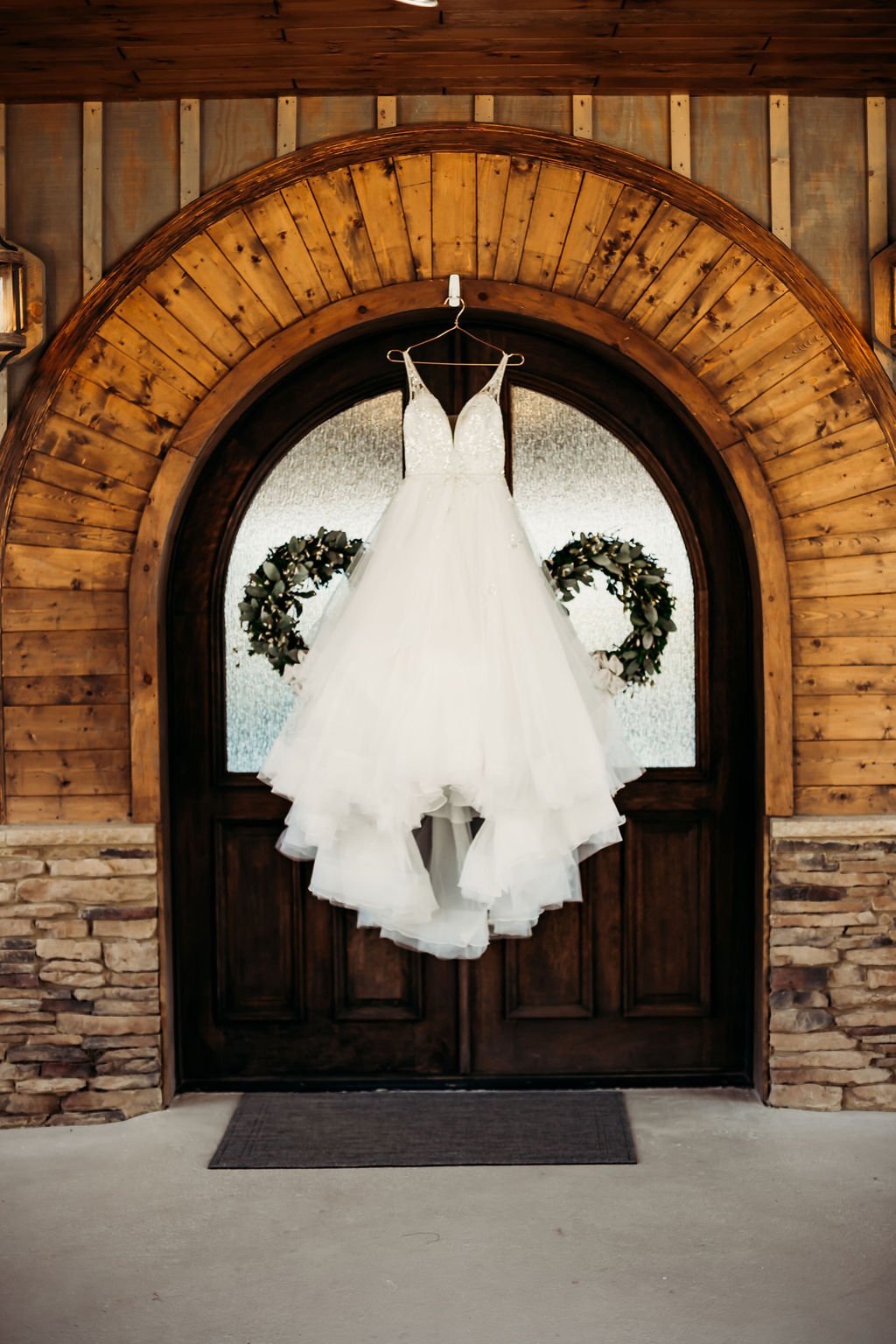 ocoee crest wooden front doors with wedding dress.jpg