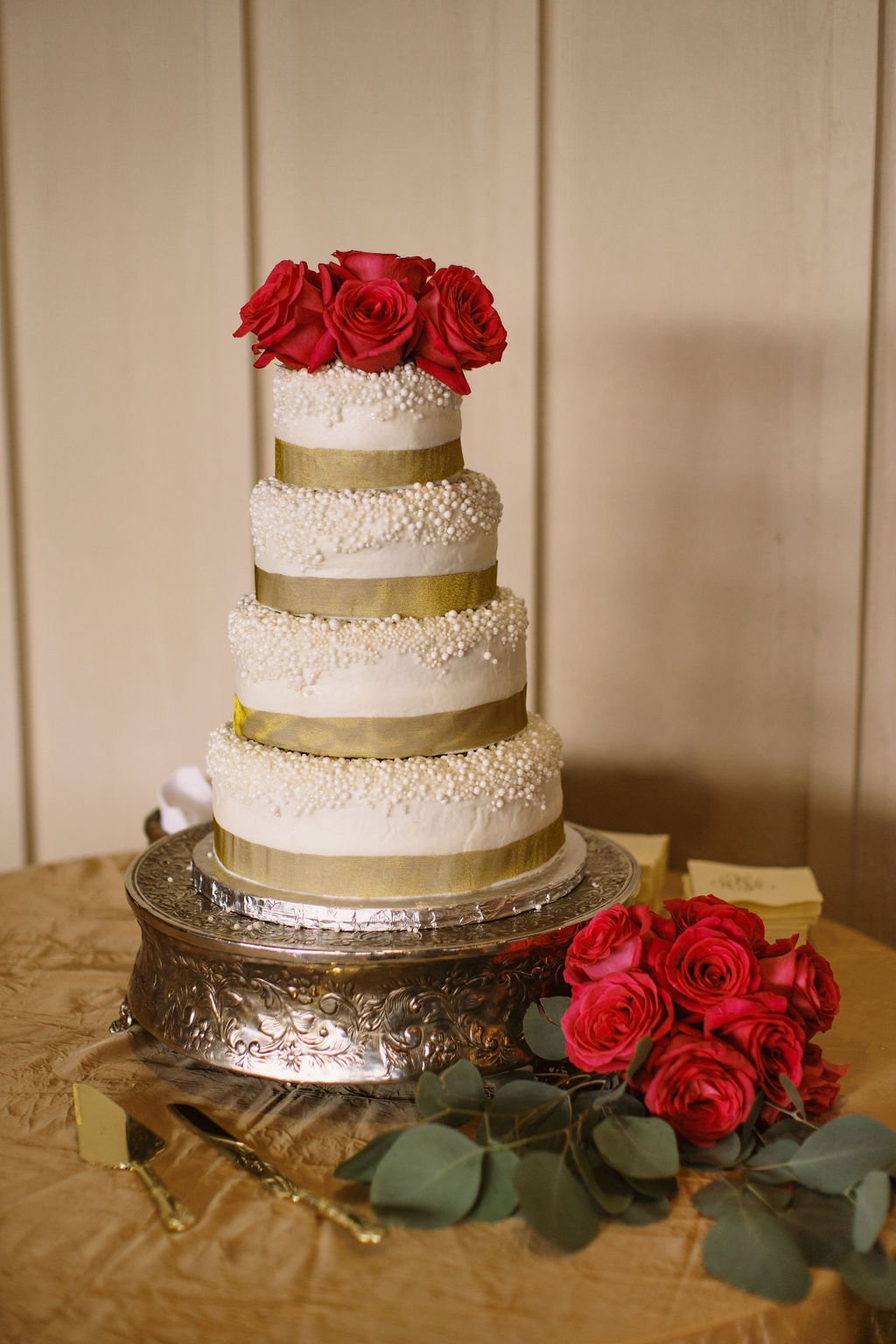 Ocoee Crest elegant wedding cake with decorative pearls.jpg