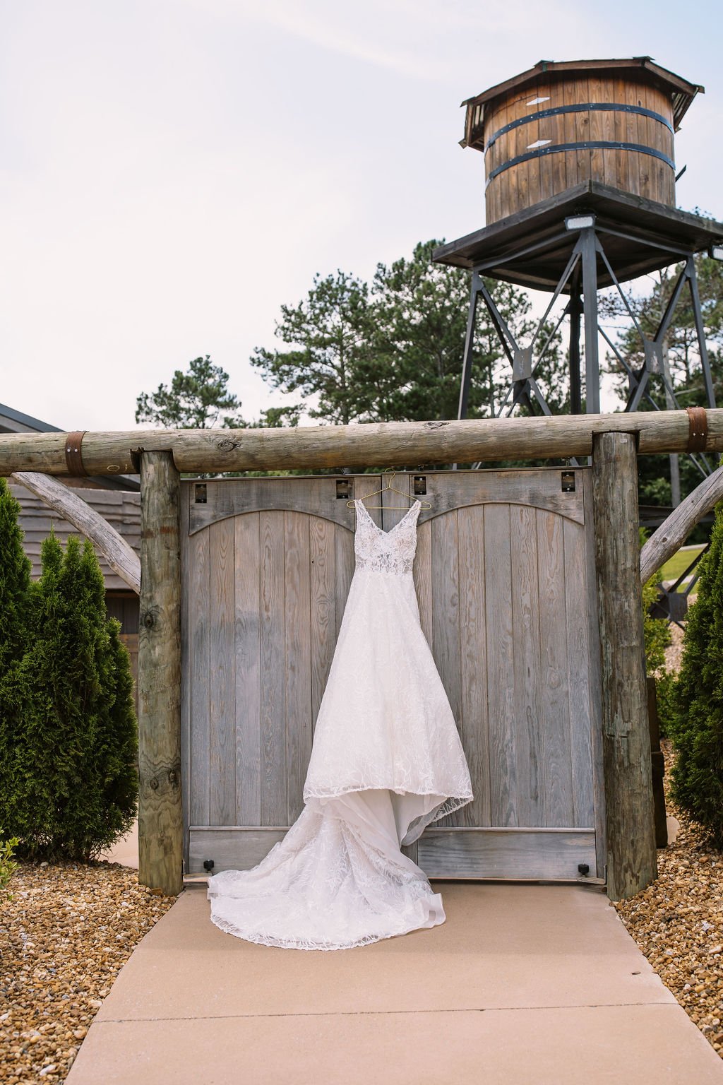 Wedding dress on barn doors ocoee crest wedding venue.jpg