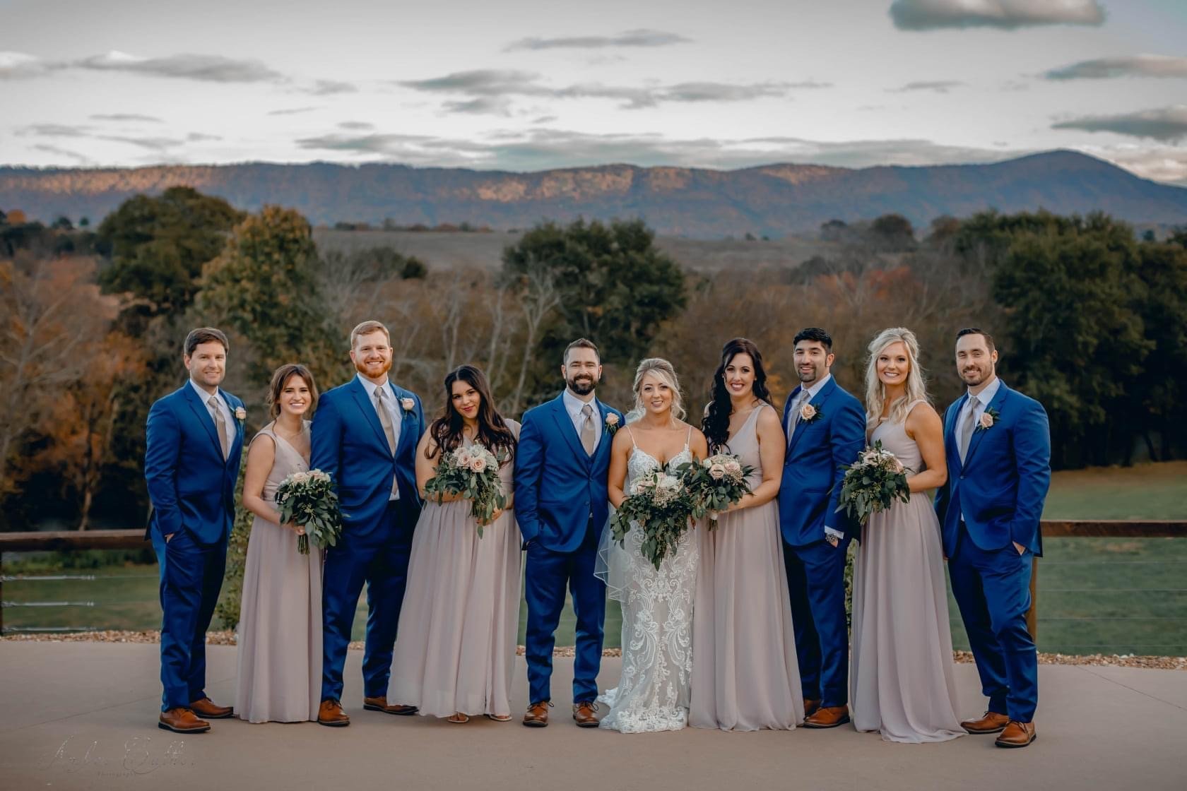 Bridal party posing with East Tennessee mountains in background