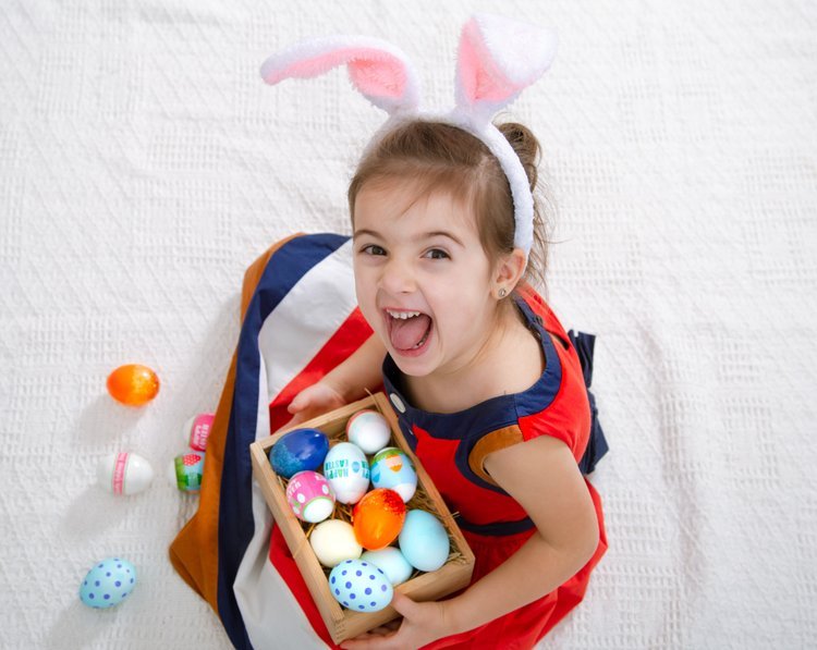 little-cute-girl-with-easter-eggs-bunny-ears-beautiful-bright-dress.jpg