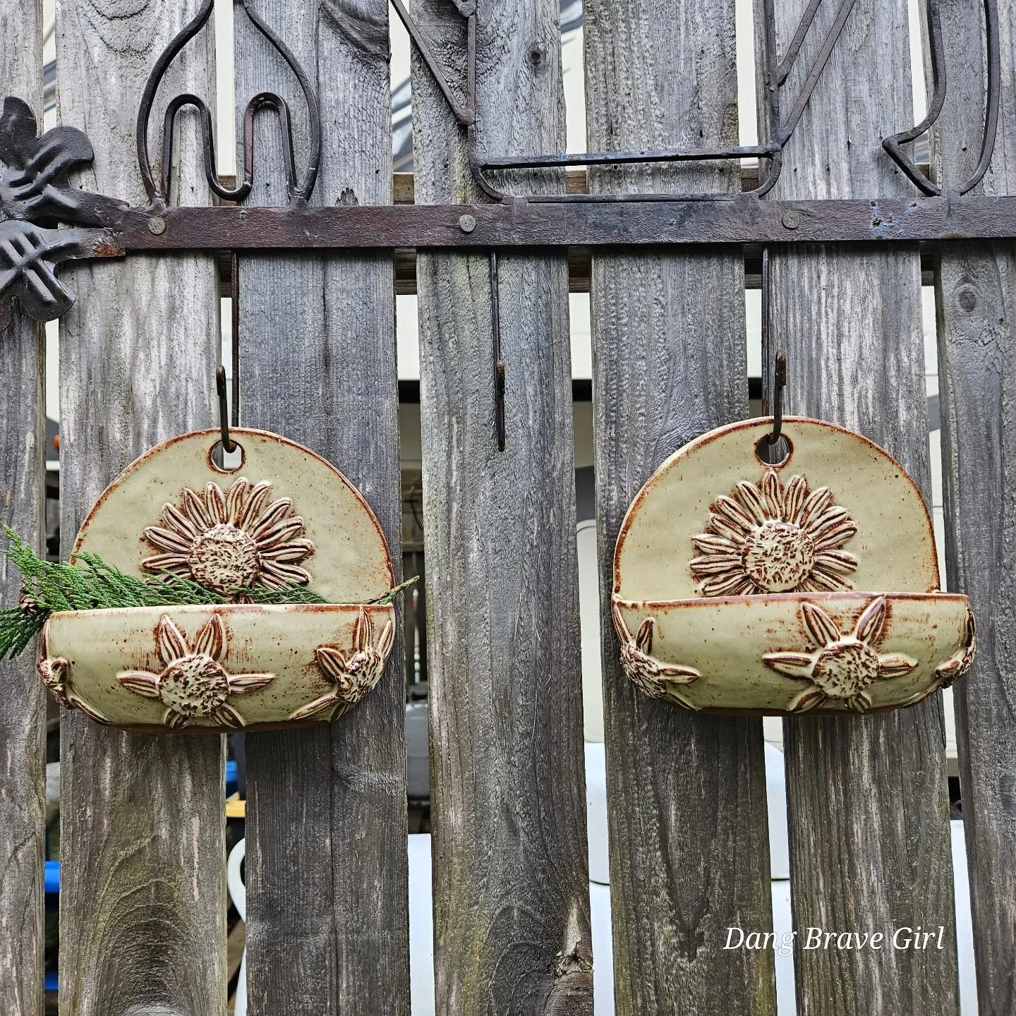 The DBH is getting pretty famous 😉 for his sunflowers and these wall/fence hangers really show them off. He made 2 (only 1 left in the shop) and I can think of about 20 different ways I'd use them....including putting one on the wall next to my cozy