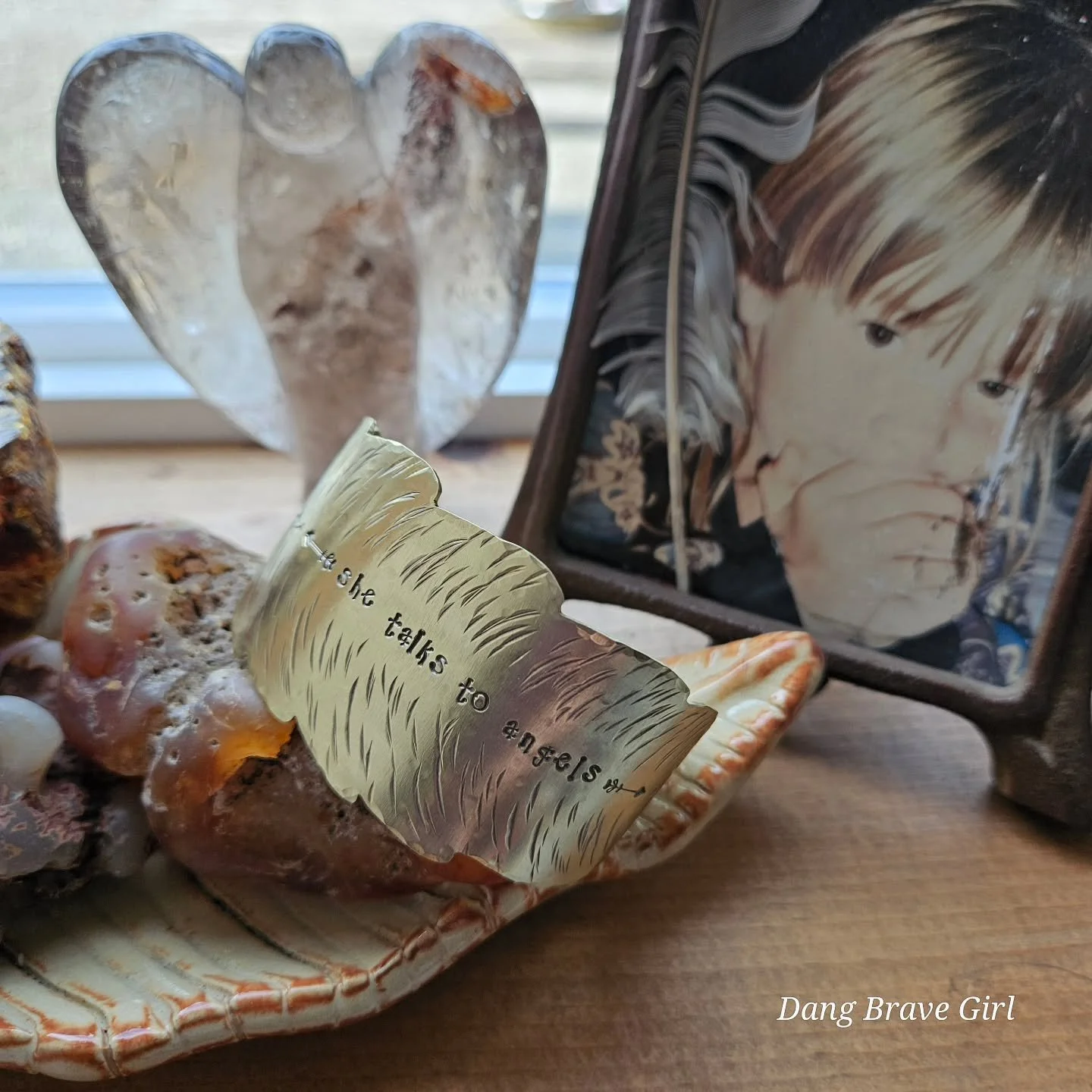 She Talks To Angels....

I've been thinking for a long time about doing a collection to honor that sentiment and truth but haven't... yet. 
This cuff is a prototype, an idea I had floating around in my head. I don't know if I'll get any further than 