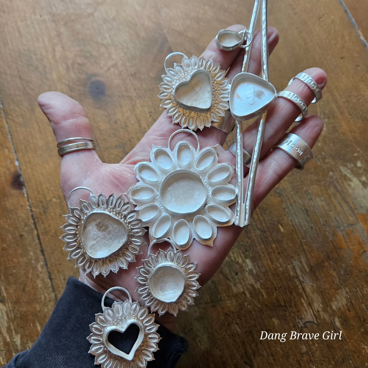 I always think of this as the magic stage....I get all the silver cleaned up from the messy making process, only to get it 'dirty' in a patina bath... but then the magic happens when it rolls around in the tumbler, getting happy and coming out with t