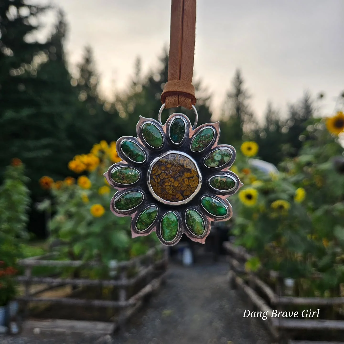 Be like a sunflower 🌻 

I just had to sneak out and catch a picture in the fading sunlight, even though I'm still polishing this pretty bloom. 
And it's a big one! 2 1/2" wide and 2 3/4" tall! It'll come on this gorgeous golden leather and