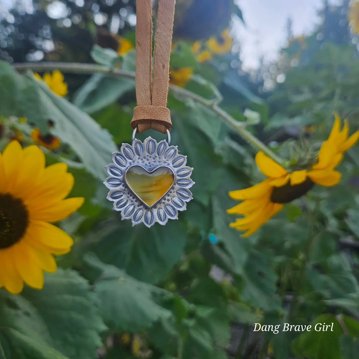 Sunflowers have a way of stealing your heart, making your day brighter and causing you to pause long enough to enjoy their wild beauty. 

If that can be harnessed into jewelry, I'm certainly gonna try and capture it for you.... and me. 

The Sunflowe