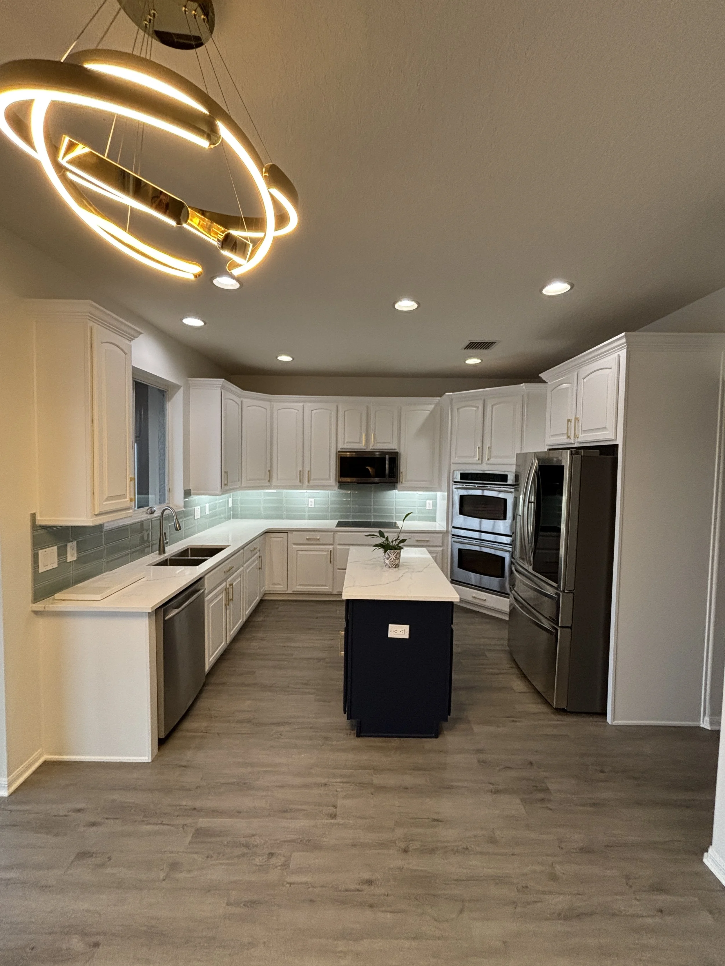 Cabinet Refinishing vs. Cabinet Painting: What You Really Need to Know Before Updating Your Kitchen