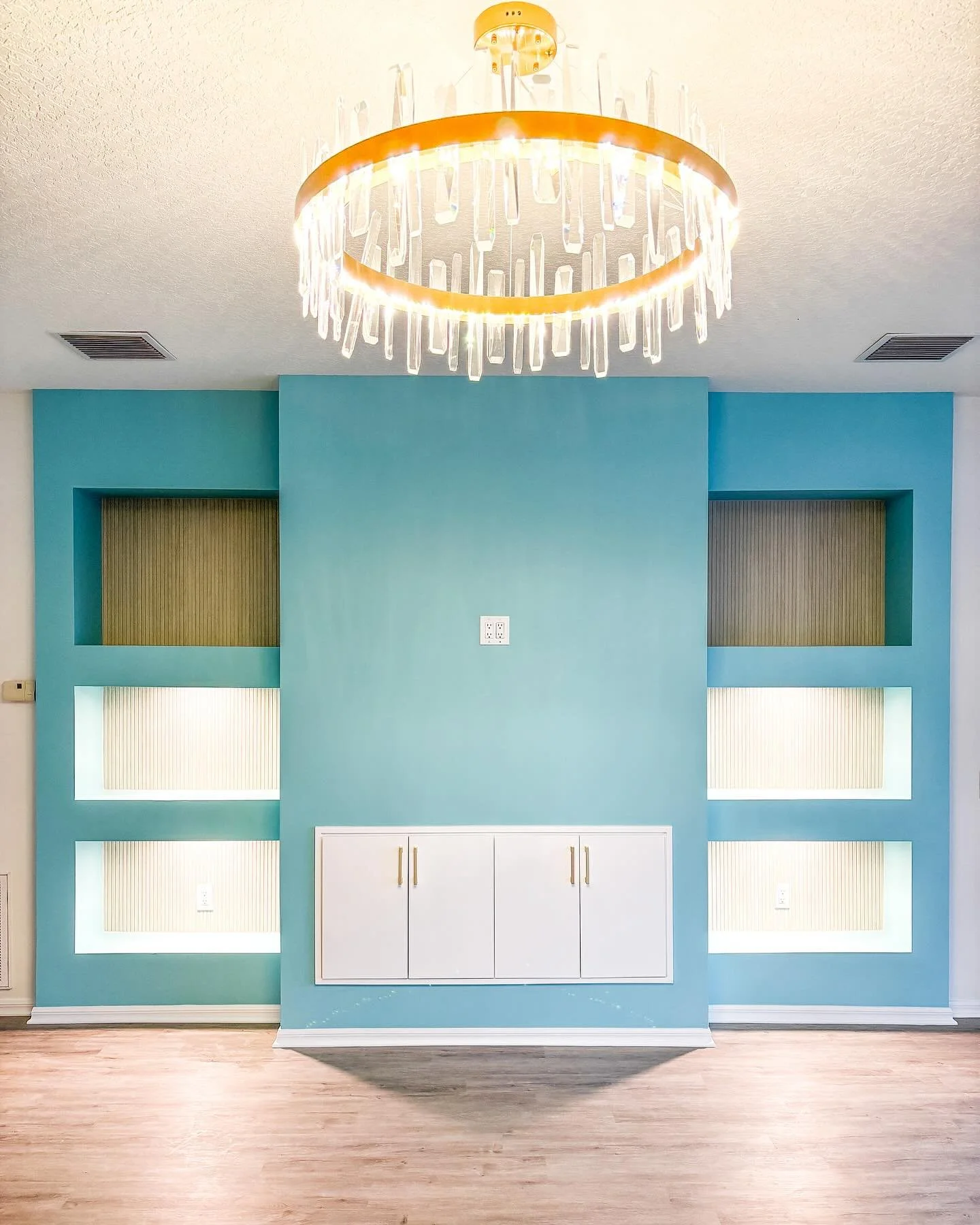 Accent wall? More like statement wall!!! 👏🏼 
#accentwall #homeremodel #storage #livingroom #interiorpaint #tampa #stpete #clearwater #aesthetic #beachhouse