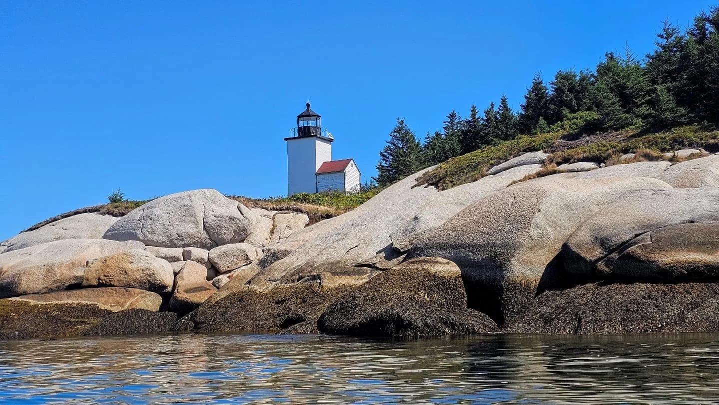 Mark Island Lighthouse of Stonington, Maine. This is the emblem of the local Island Heritage Trust that preserves many of our favorite islands. It used to actually have a house and was quite built up in the past, as you can see from these old photos.