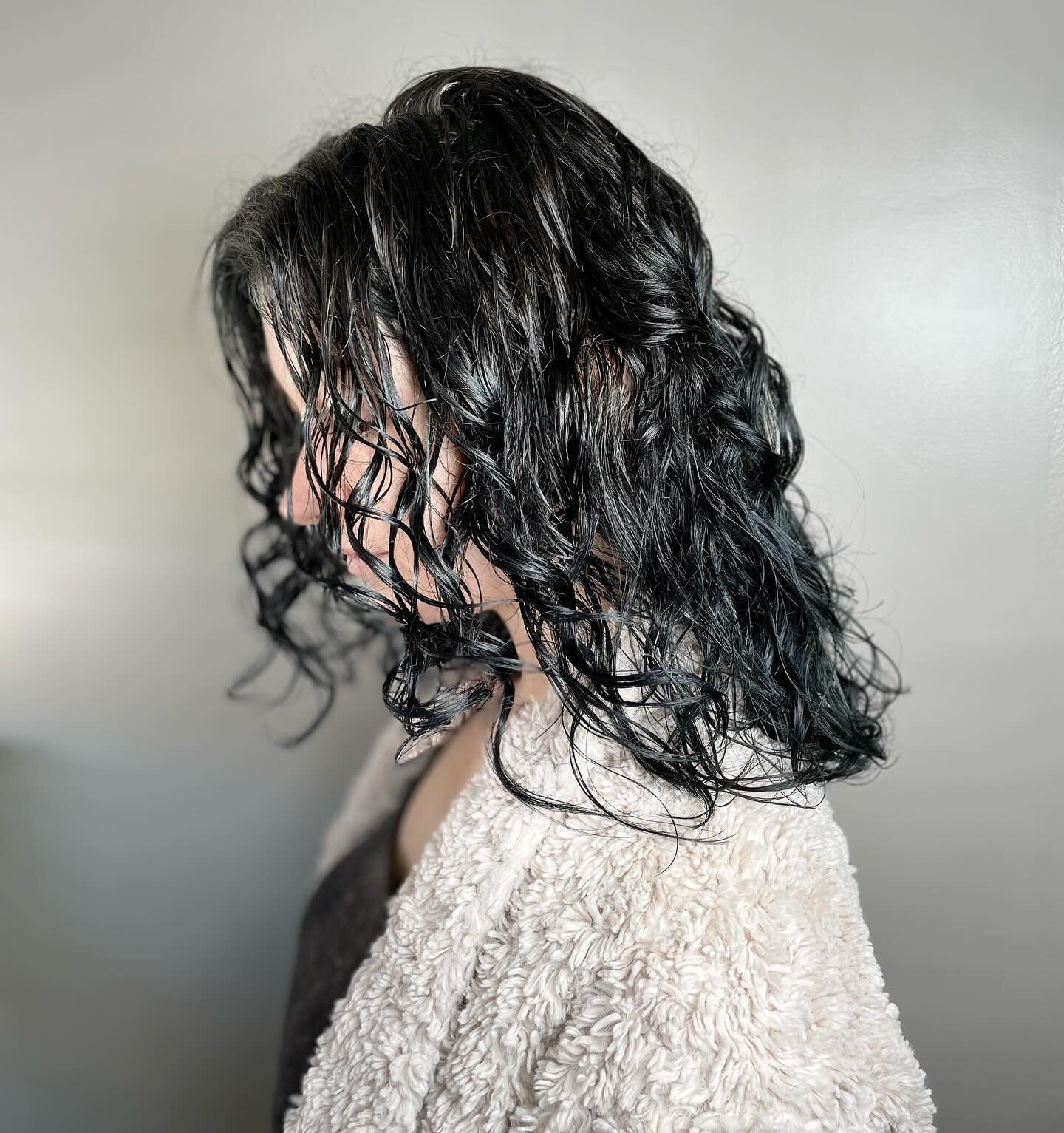 Diving into the deep hues of blue-black curls &ndash; because life is too short for ordinary hair. Unleash the magic, embrace the curls! 💙🌀✨ 

.
.
.
.
.
.
#salon6
#broadripple
#broadripplesalon
#broadripplehair
#villagepeople
#euforapro
#salontoday