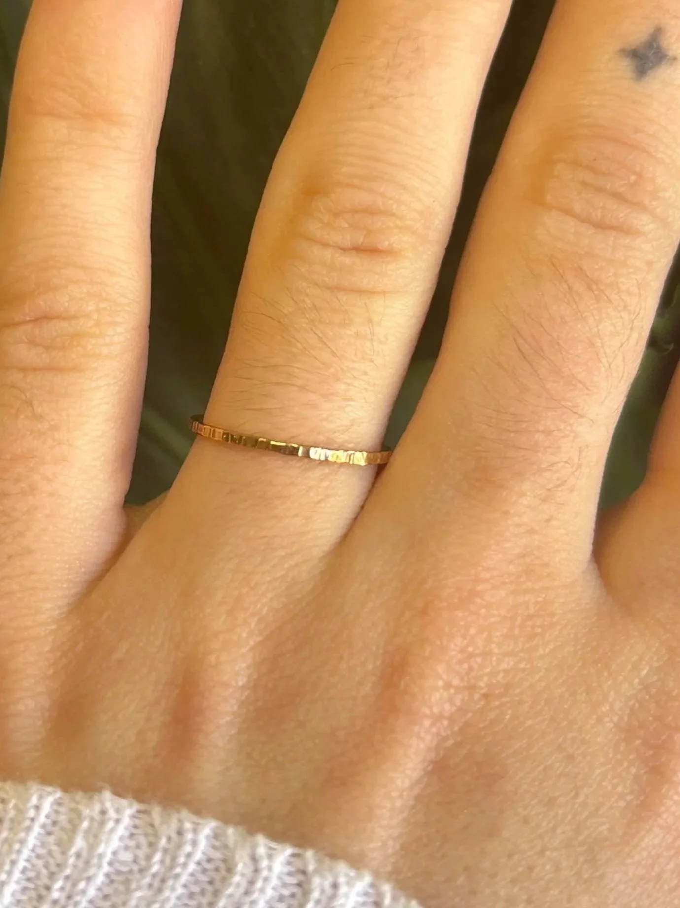 Handmade hammered gold rings New Orleans jewelry workshop