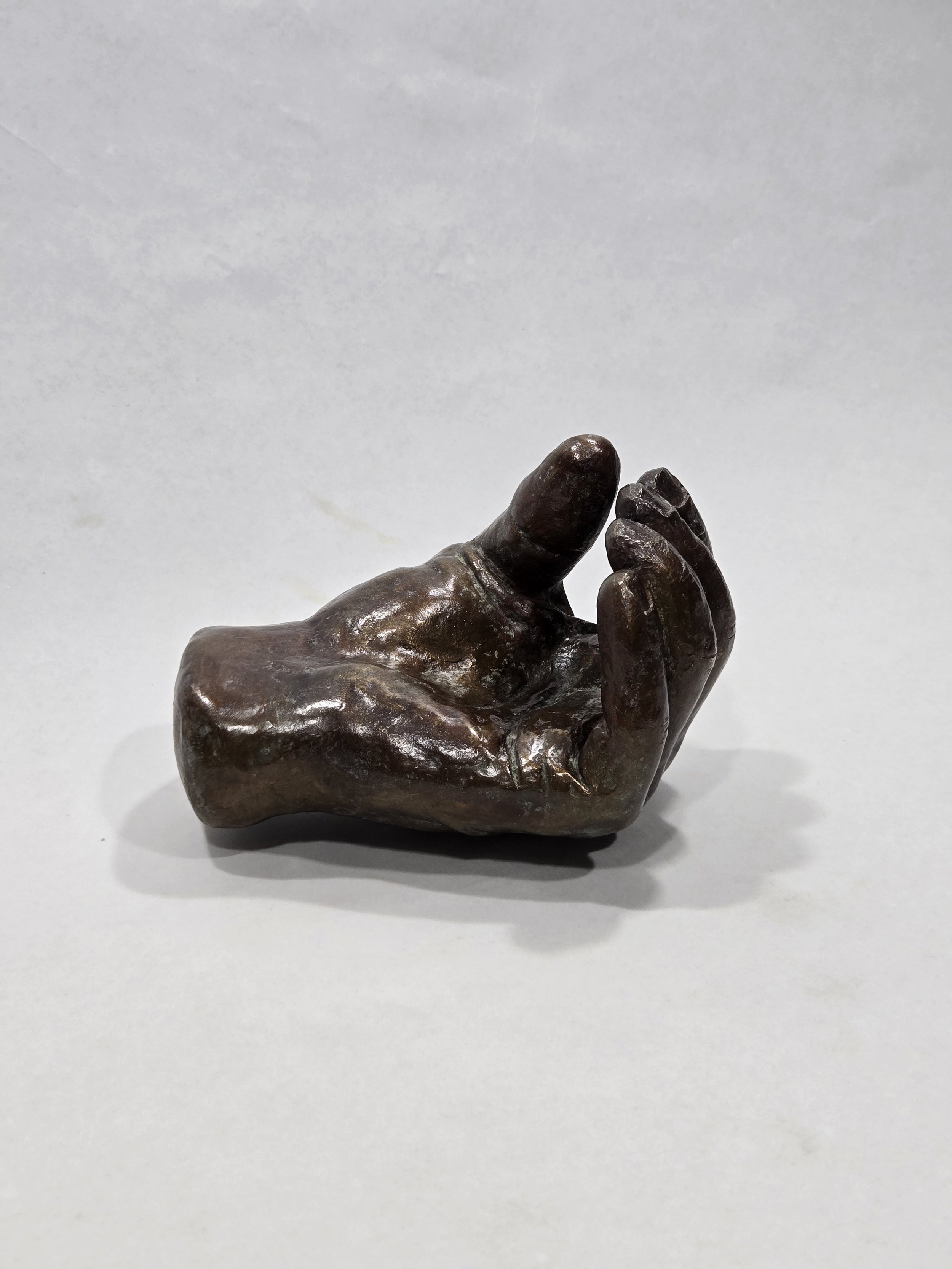 For the record, $1950, bronze, 4.25 x 5.5 x 3.75