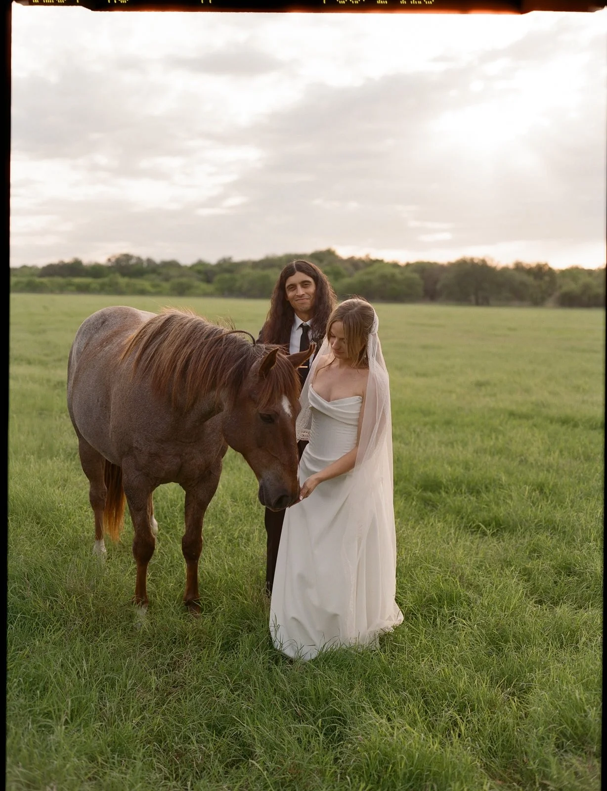 Trying to condense three magical days at the family ranch into just 20 photos is nearly impossible. Mia and Alex&rsquo;s weekend was nothing short of epic. They say rain is good luck, so after weathering hail, rain, and lightning to reach a glowing s