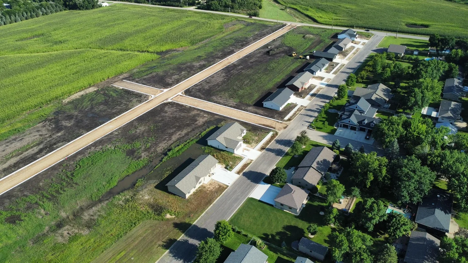 Aerial view of new single-family homes and streets in the JAG residential development in Milbank, SD.
