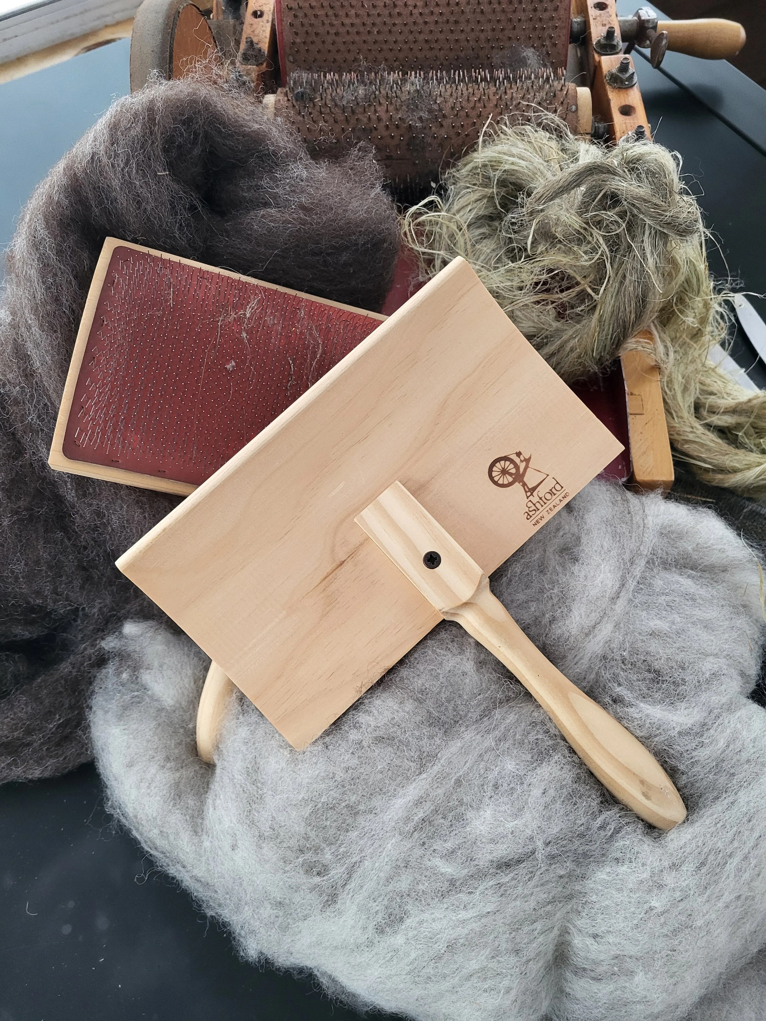 Carding - hand &drum - Birch Bark Fibre Arts (S. LeBlanc).jpg