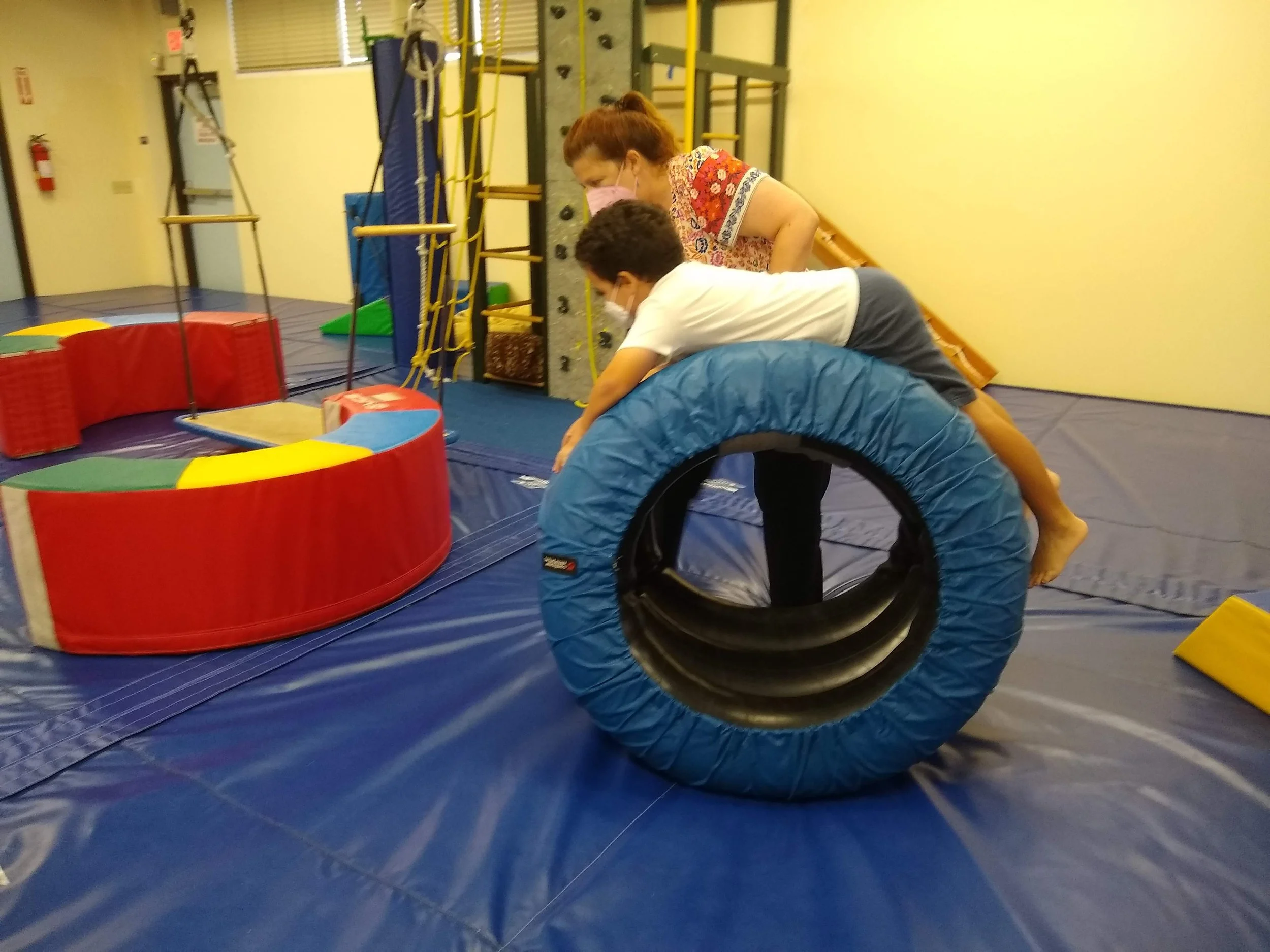 Declan participating in an occupational therapy session.