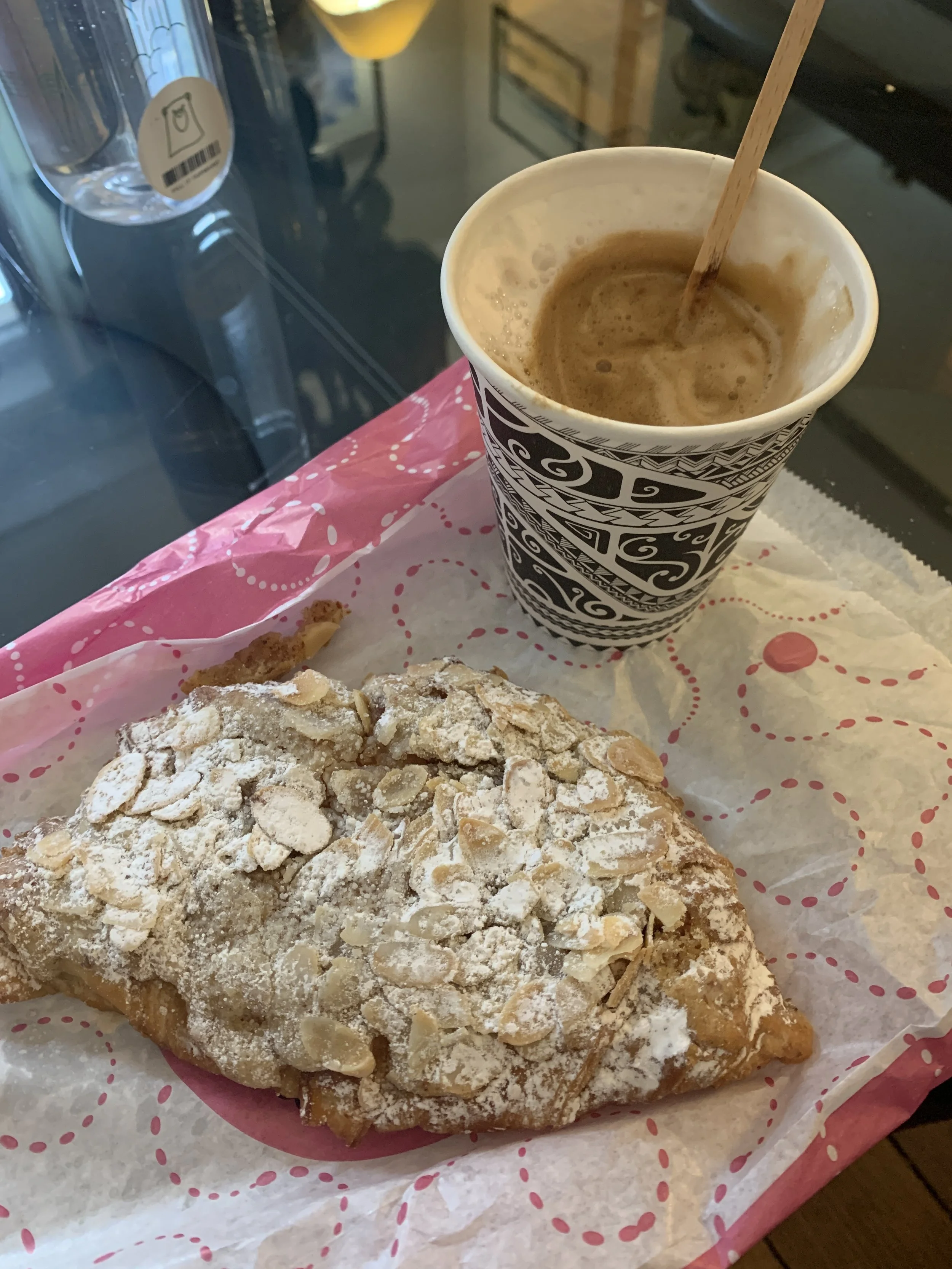 Breakfast my first morning in Paris: almond croissant and a café au lait.