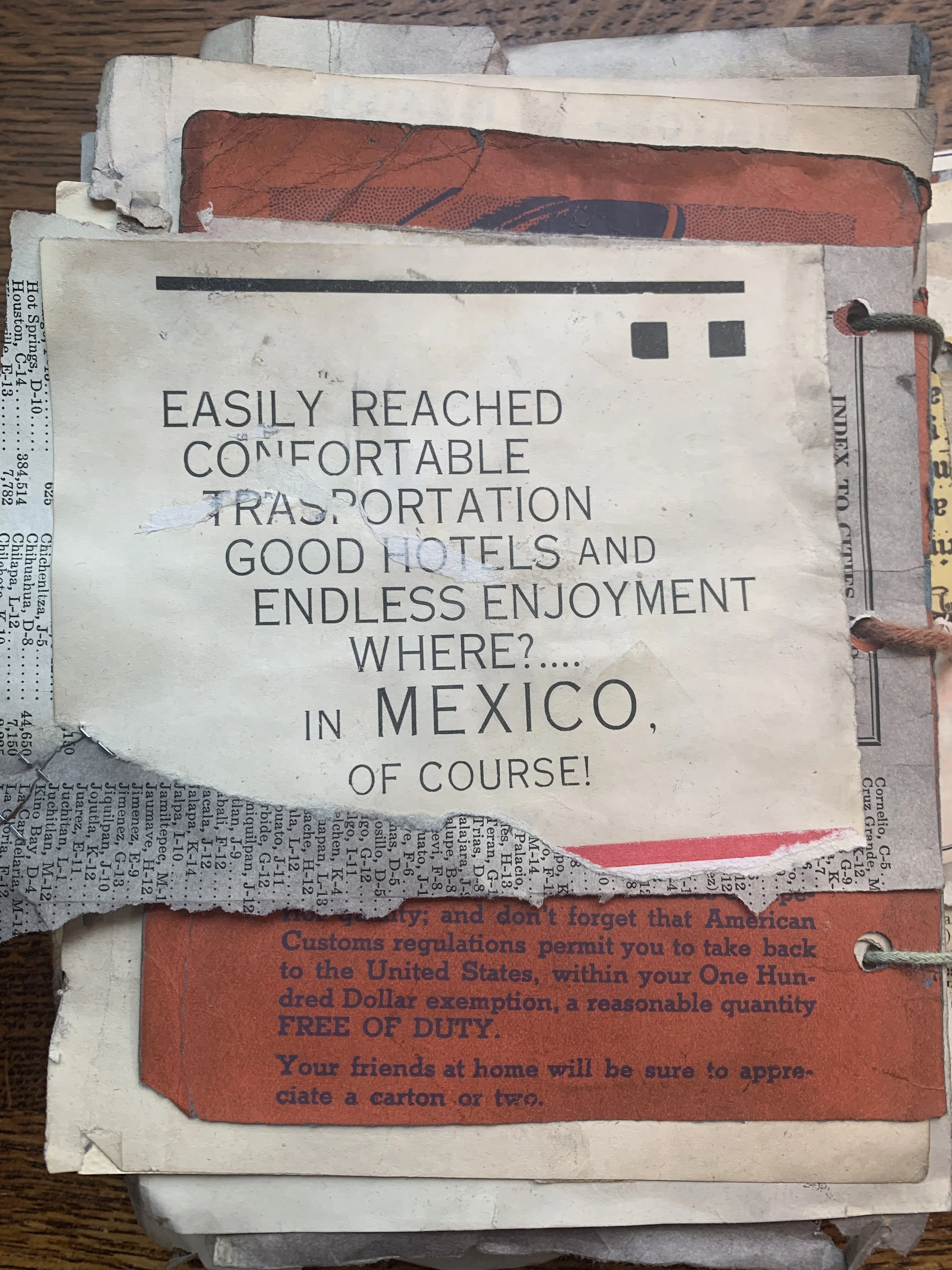 Handmade travel journal page with sketches, handwritten notes, and layered papers documenting a travel memory.