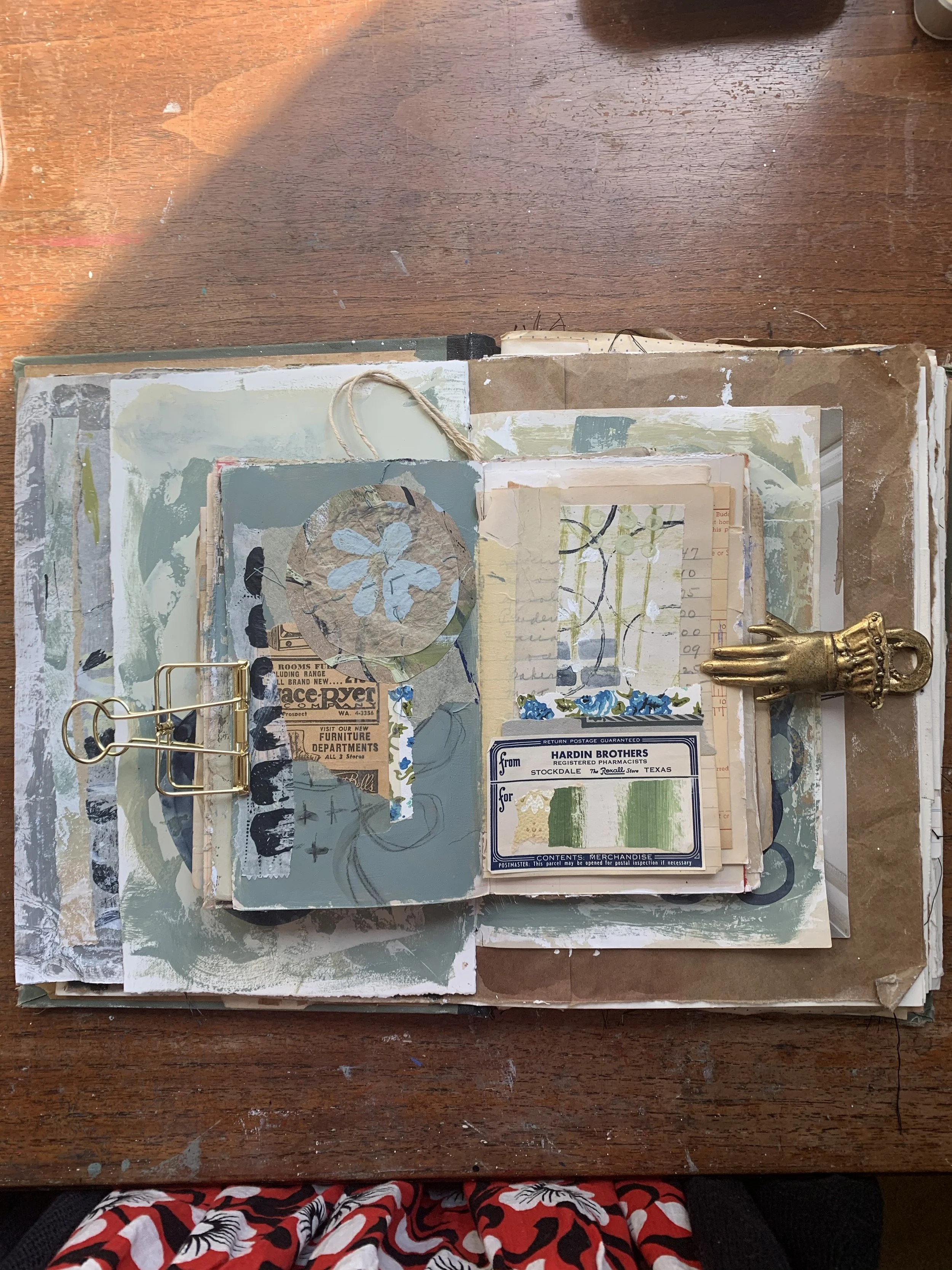 Layered art journal page exploring storytelling through fragments and texture.