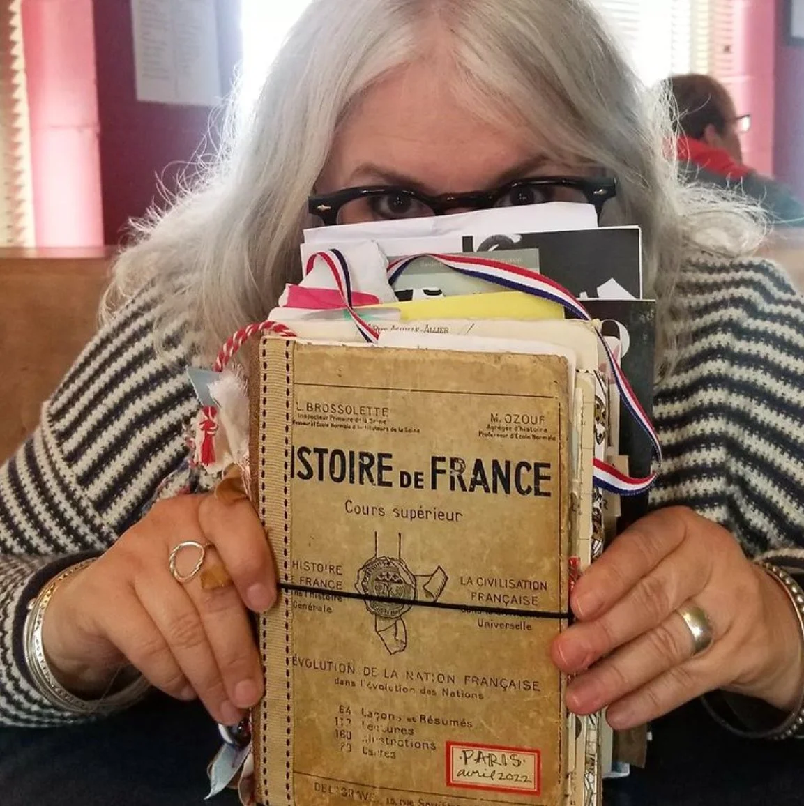 The author with her bespoke vintage travel journal chronicling creatively her trip to Paris.