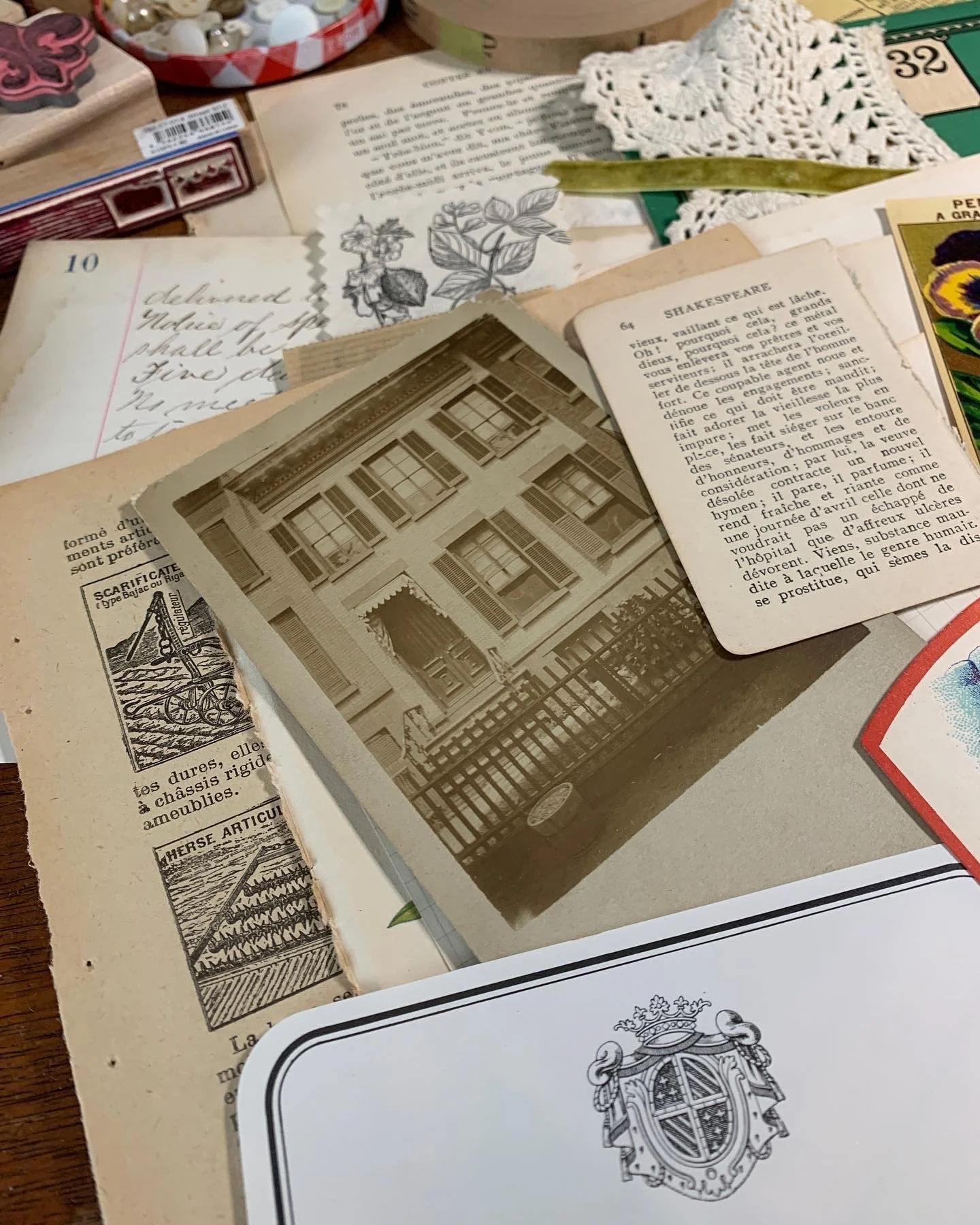 Vintage travel journal collage page with Paris ephemera, layered papers, handwriting, and travel memories.